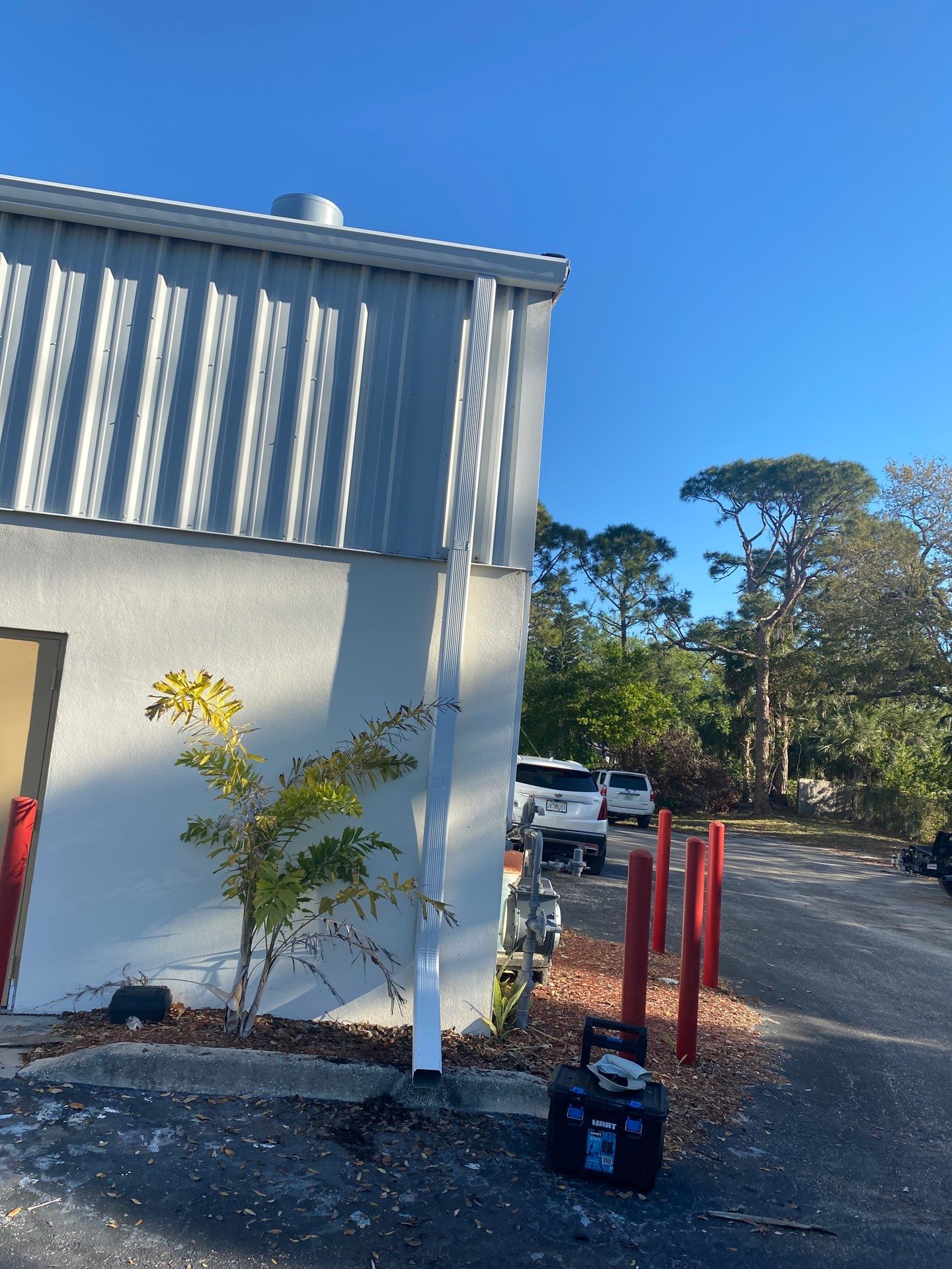 White 6-Inch Gutters with Downspouts in Bradenton FL by Gutter Professors