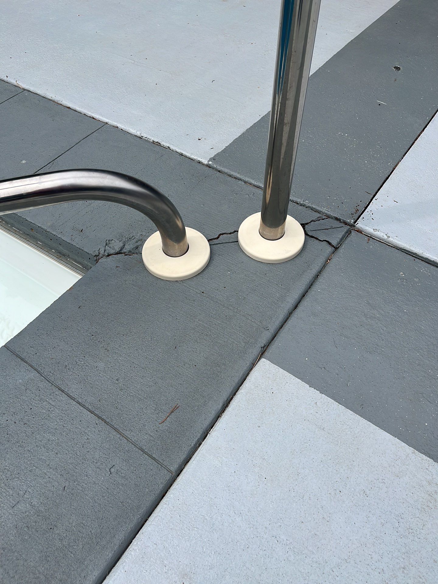 Decorative Concrete Pool Deck and Patio Resurfacing in Sioux Falls by Select Painting, Coatings & Garage Cabinets