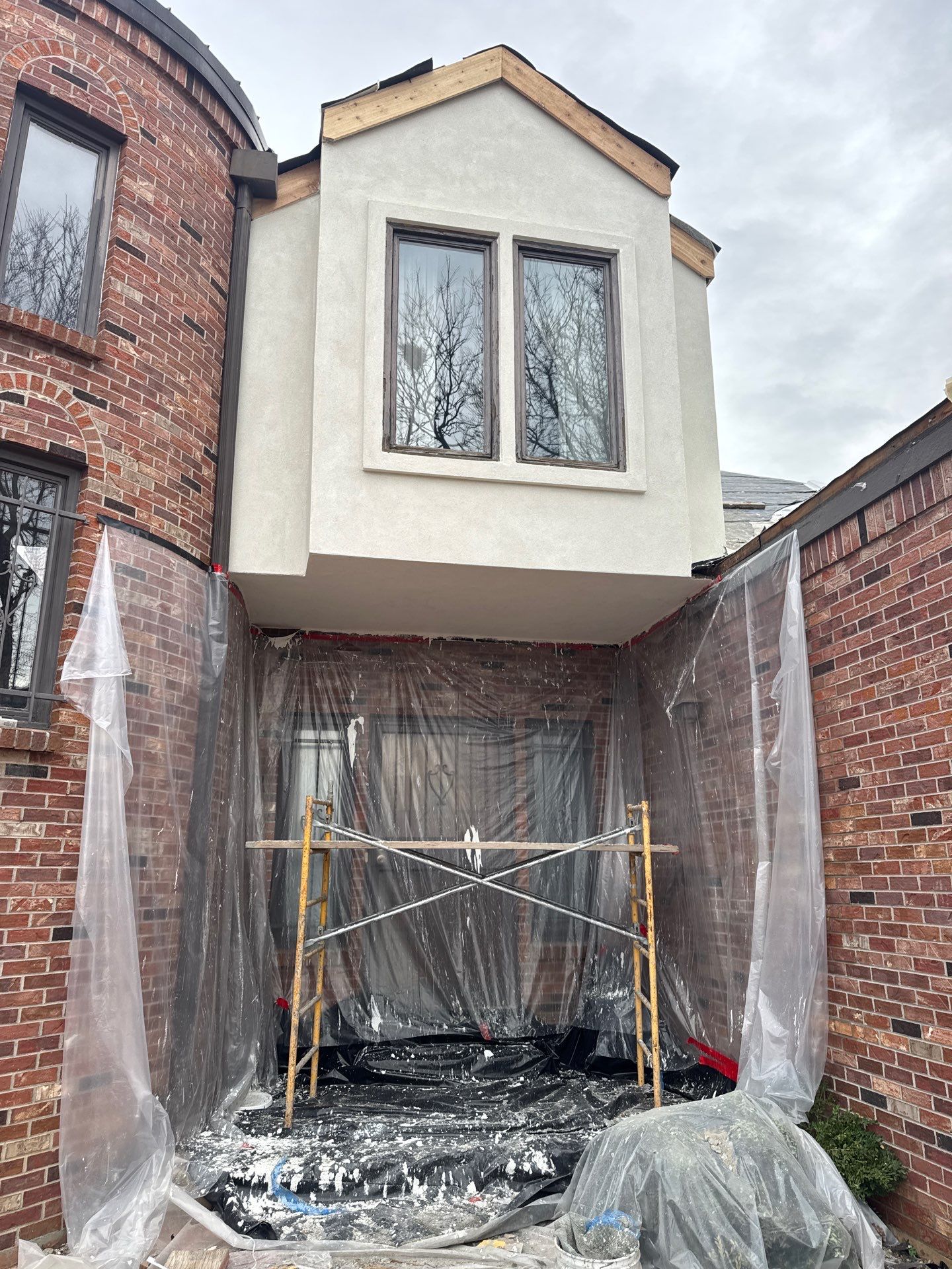 Unified Stone Coated Roof & Stucco Remodle by Blue Peaks Roofing LLC