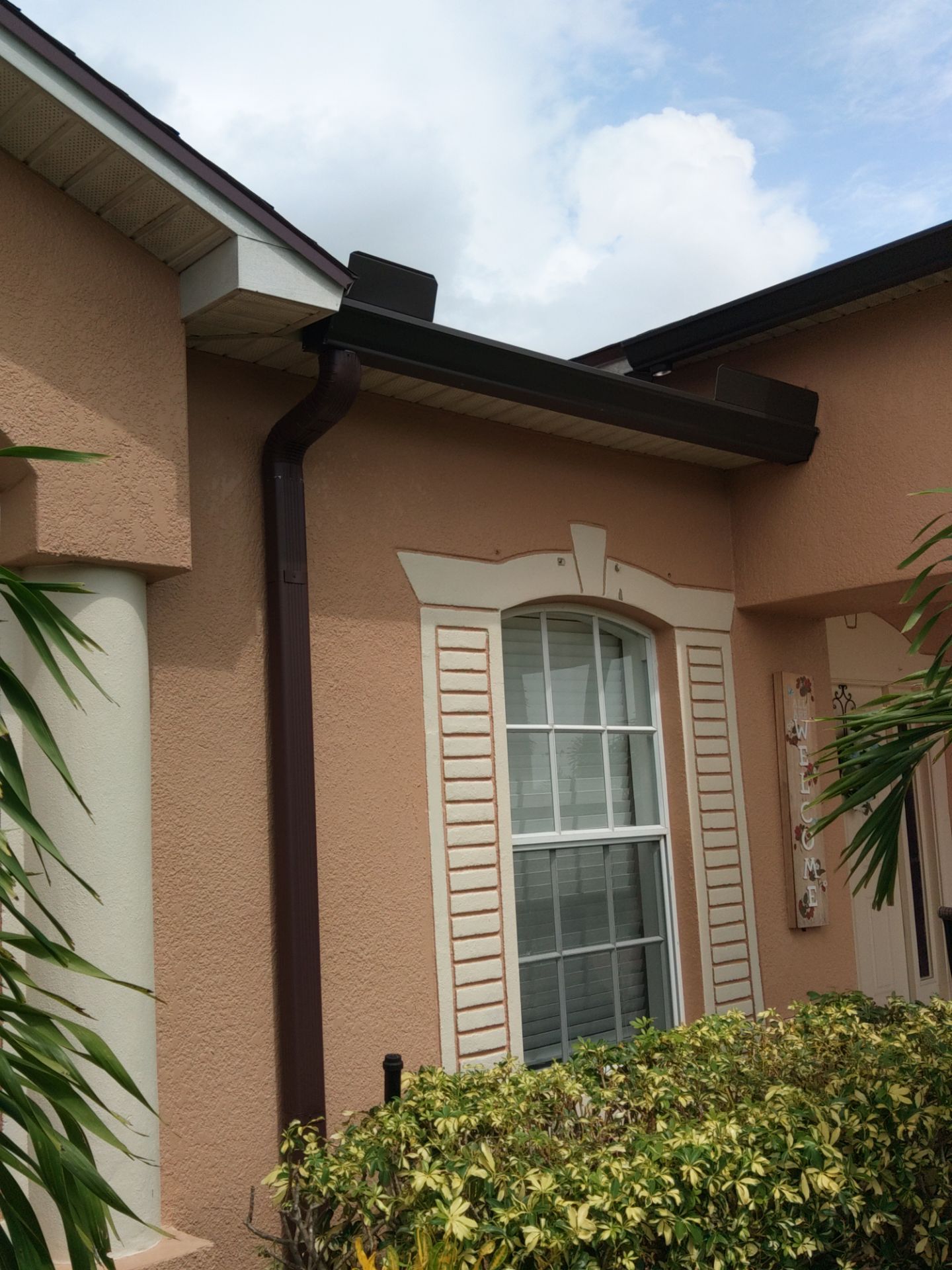 Downspout Installation for Multi-Story Homes in Cape Coral FL by Gutter Professors