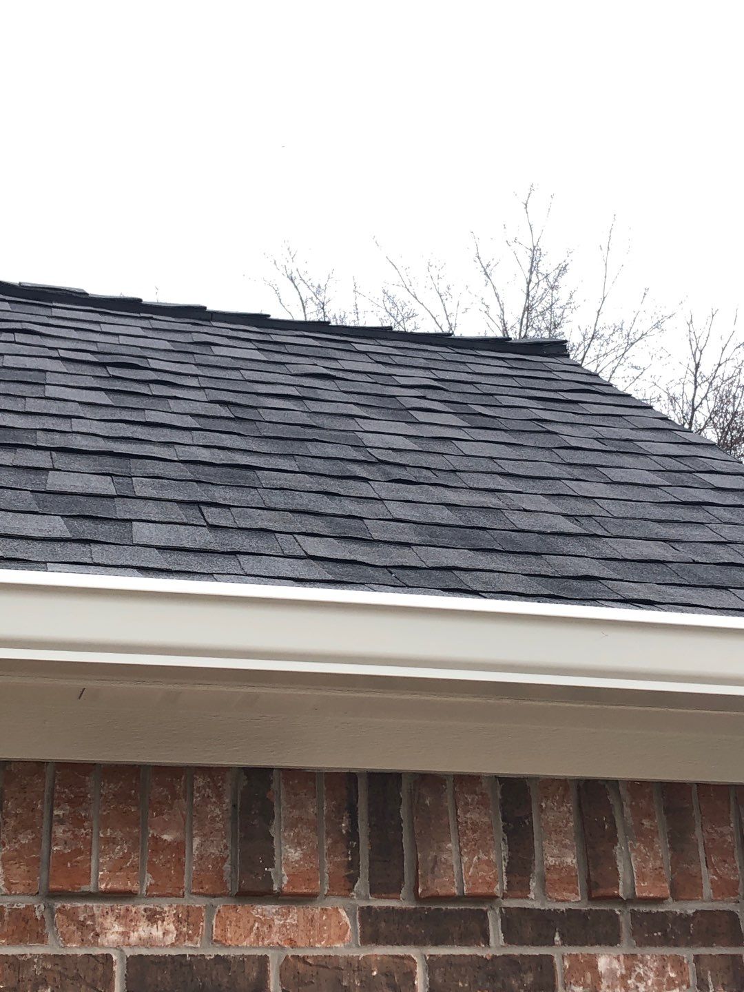 Certainteed Landmark Moire Black Roof project by Springtree Restoration 