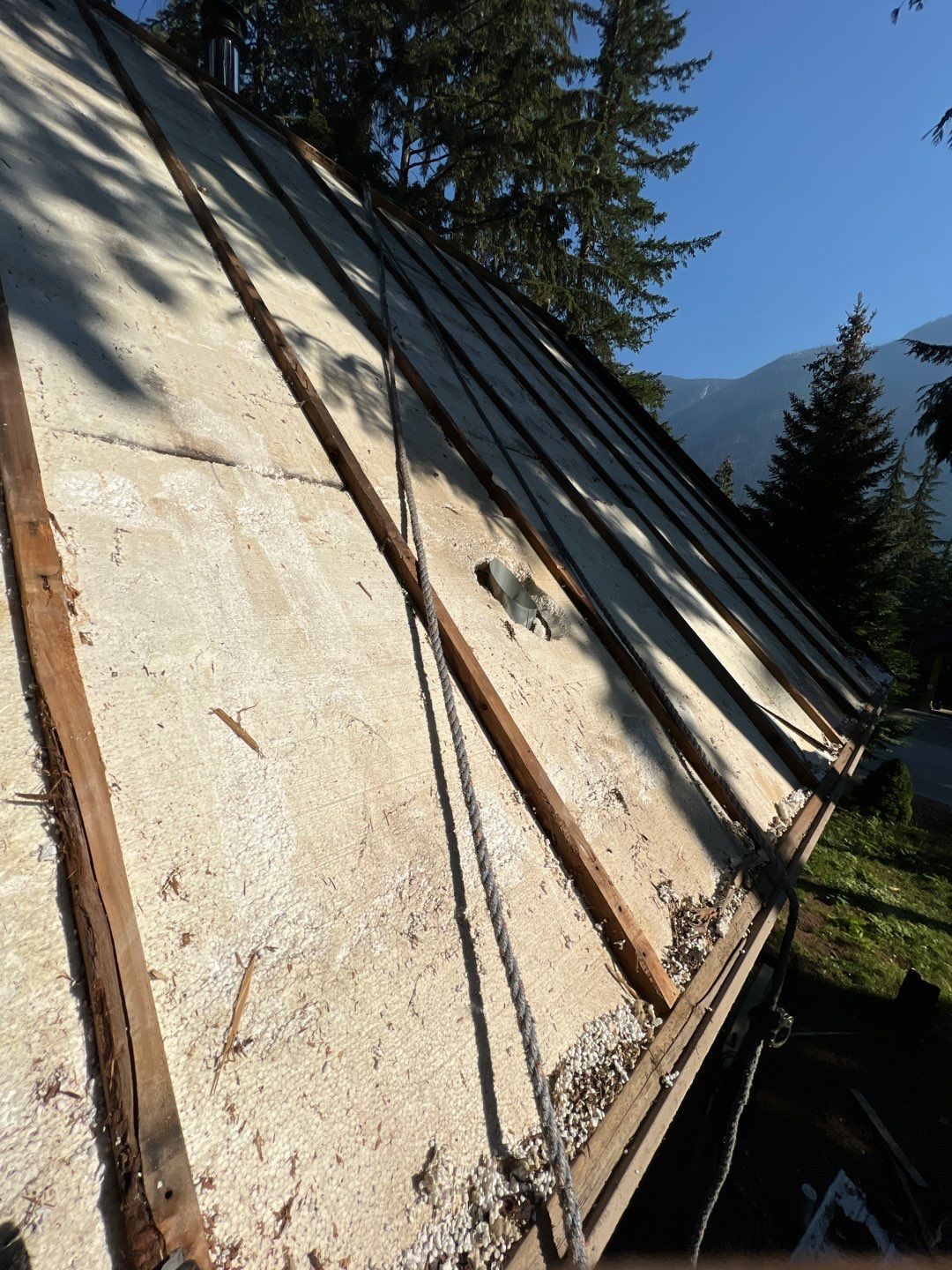 Residential ReRoofing Installation using 12" Prolok metal  by Top Notch Roofing Inc