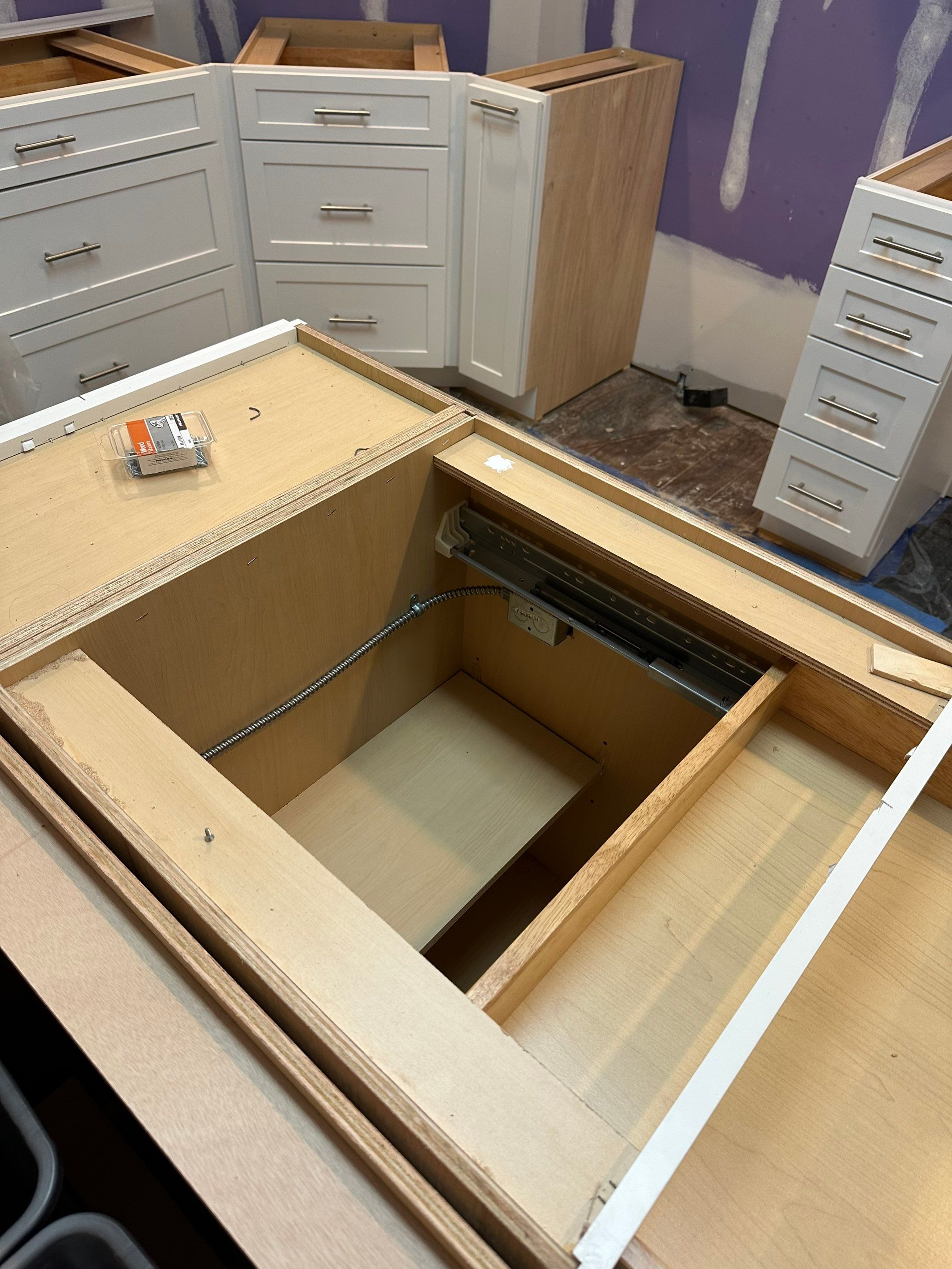 Complete Kitchen Renovation Featuring White Shaker Cabinetry in Fayetteville by Karcher Roofing & Construction