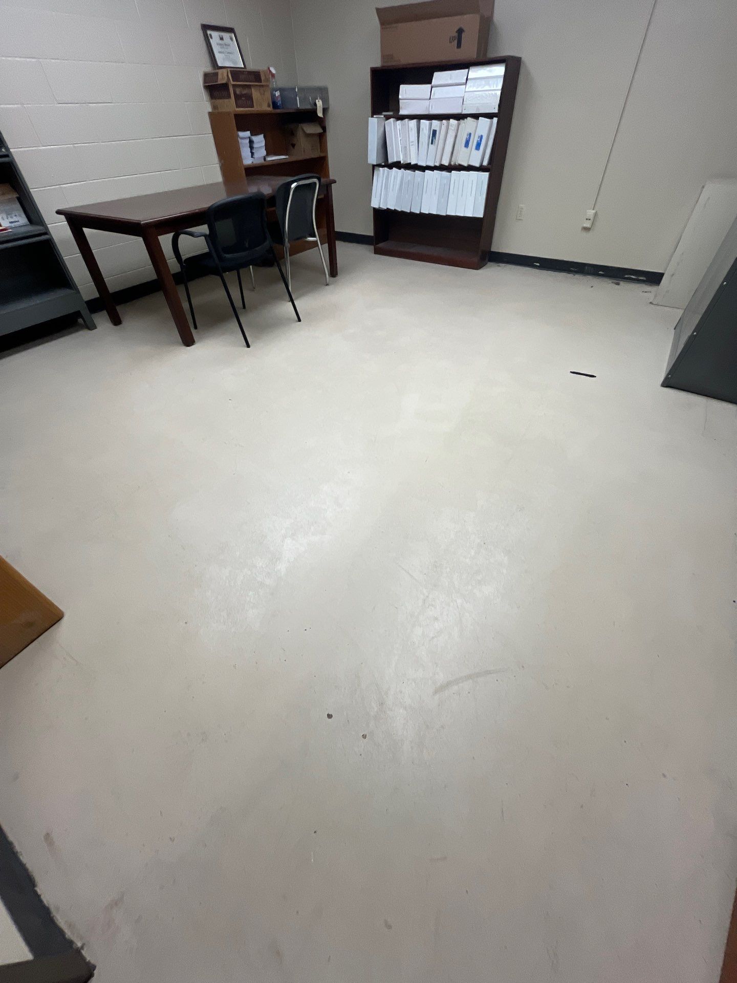 Industrial Flake Epoxy Floor Installation at Pierre National Guard Facility by Select Painting, Coatings & Garage Cabinets