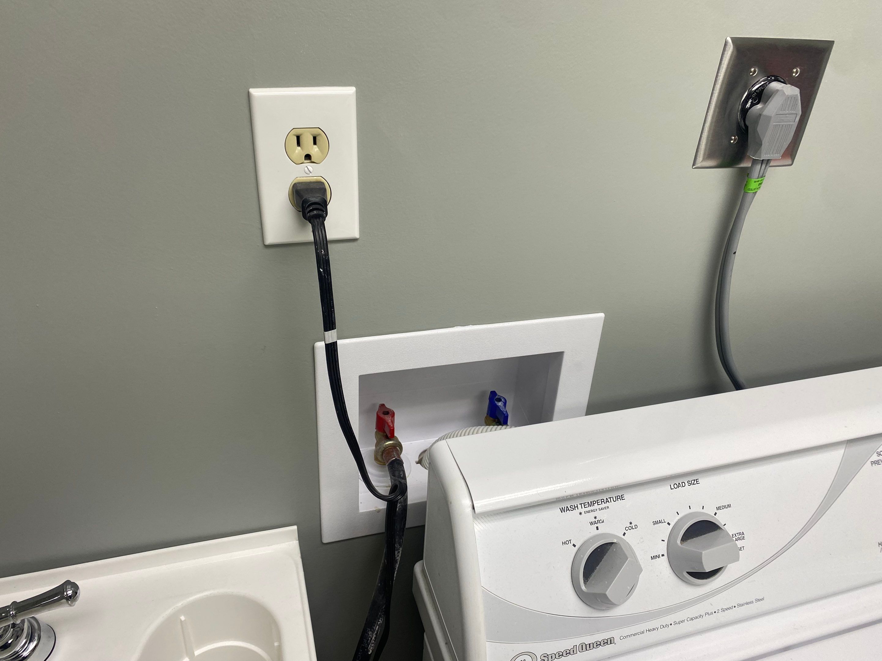 Laundry Room Redmodel using Lifeproof Luxury Vinyl Plank Flooring by The Smet Companies, LLC