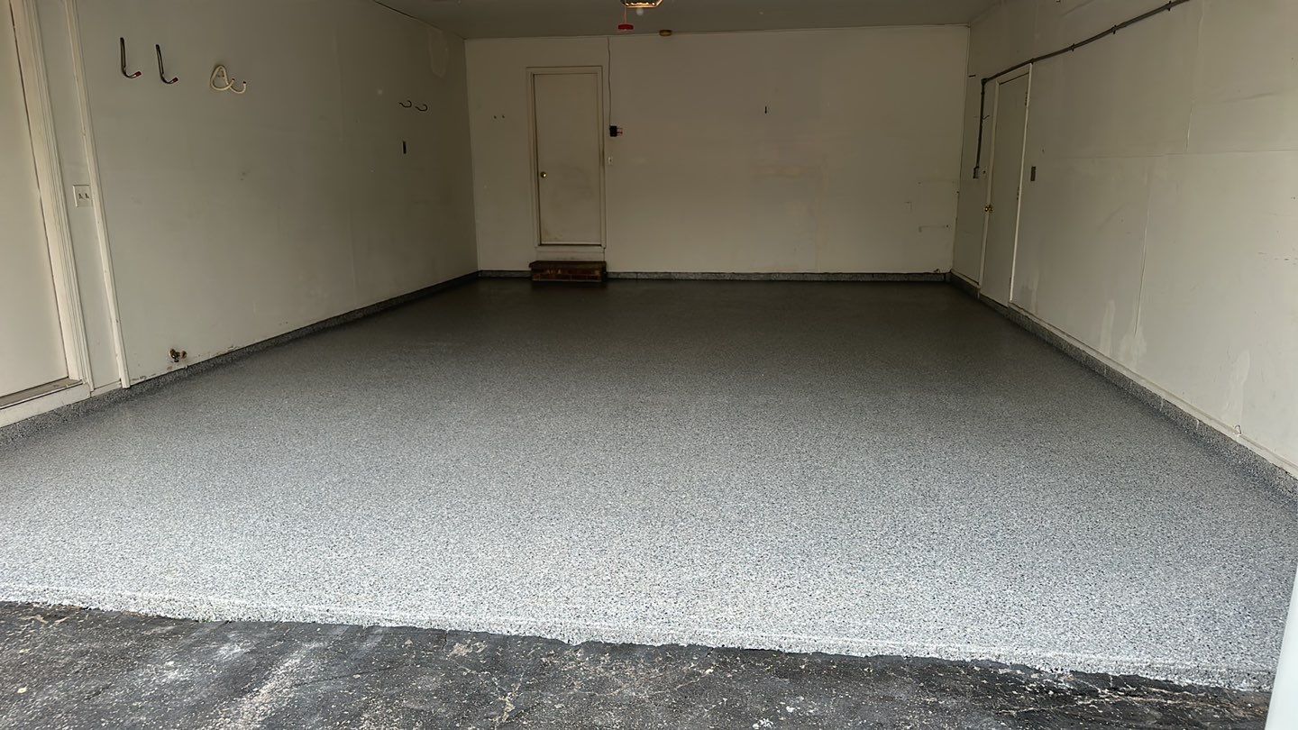 Silverado garage floor coating  by NG Masonry & Construction LLC