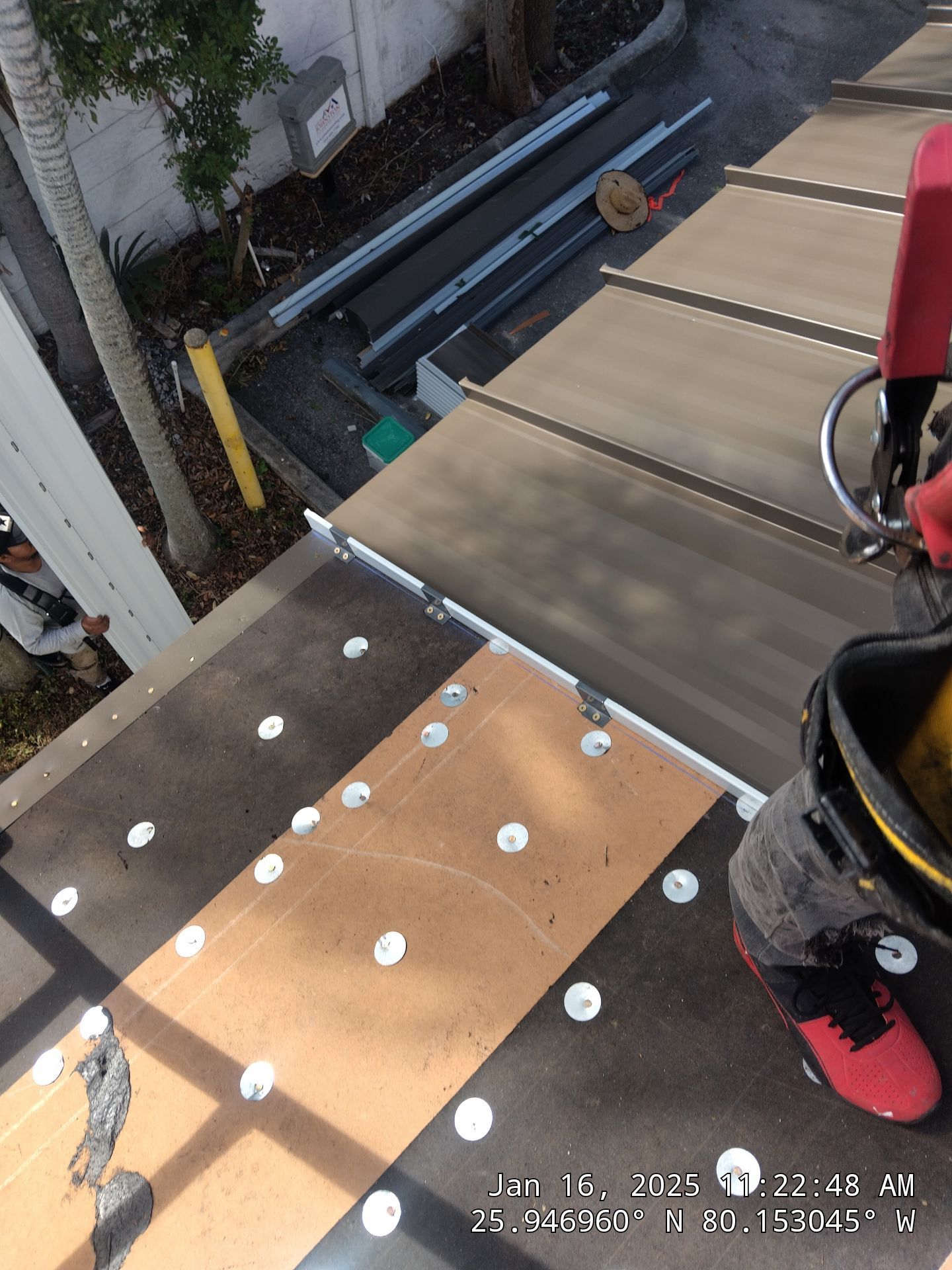 COMMERCIAL REROOF 24 GUAGE MEDIUM BRONZE 1-1/2" MECHANICAL SEAM "ZEBRA METHOD" by Earl W. Johnston Roofing 