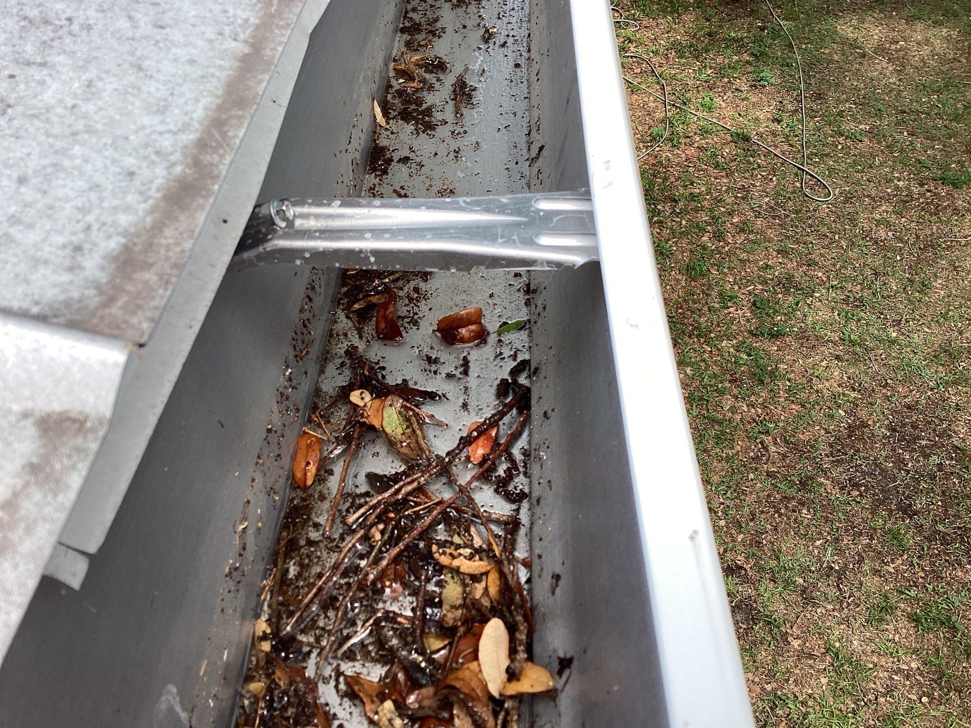 White 6-Inch Gutters and Leaf Guard Installation in Fort Myers FL by Gutter Professors