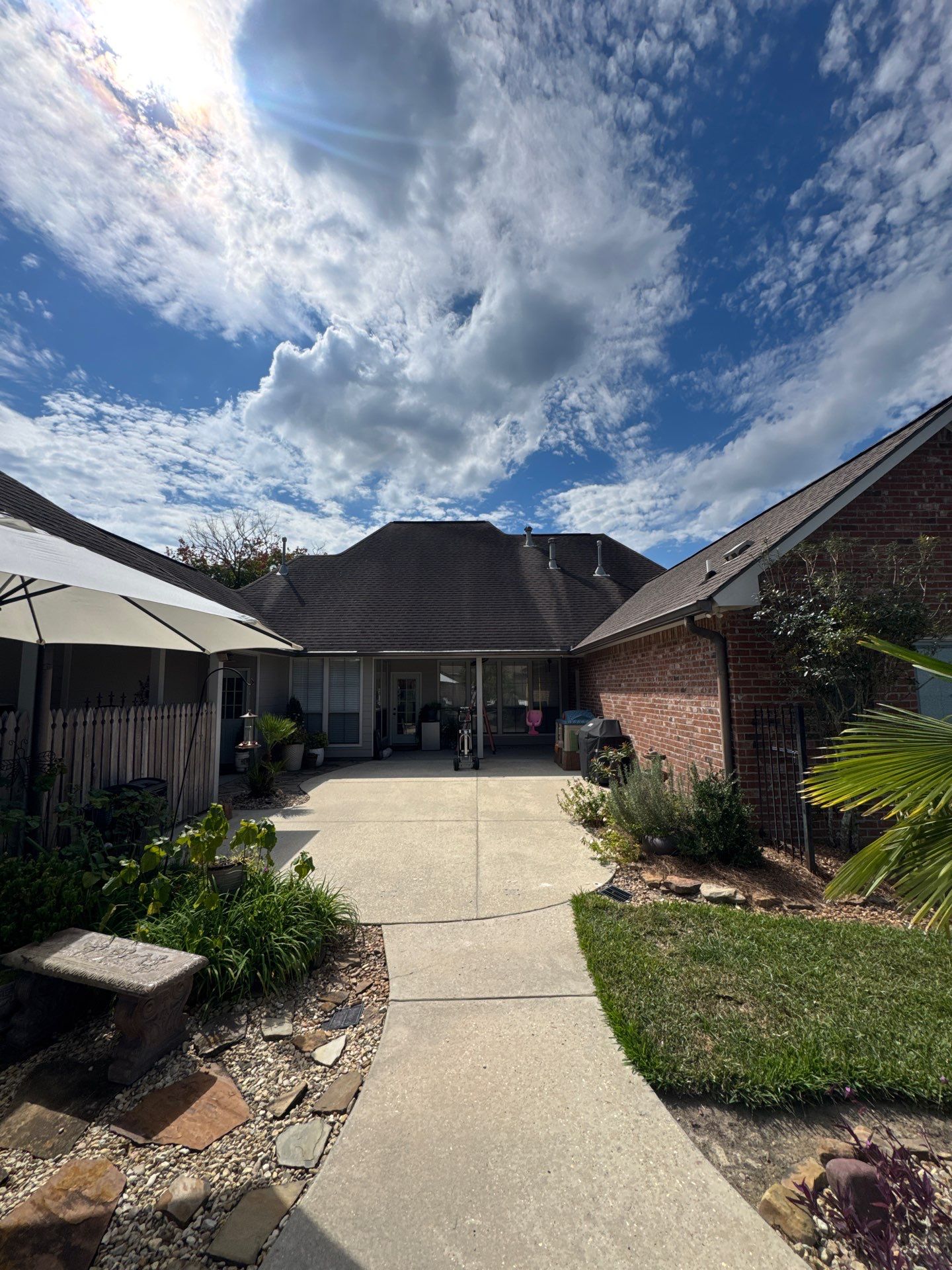 Certainteed Landmark Weathered Wood w patio extension by Top Team Roofing & Construction