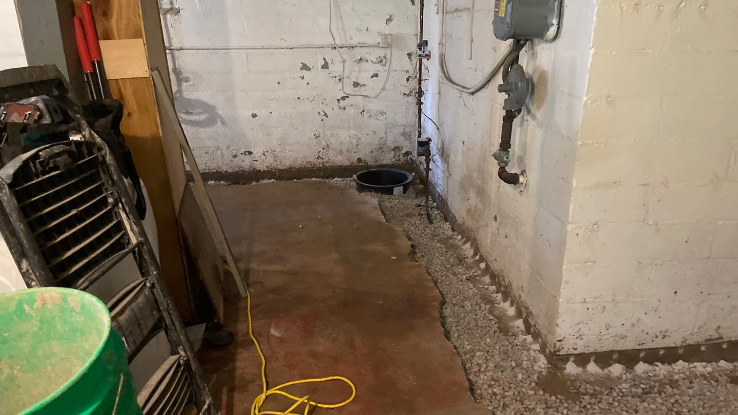 Interior Drain Tile & Sump Pump System in North Minneapolis by Waterproofing Northeast