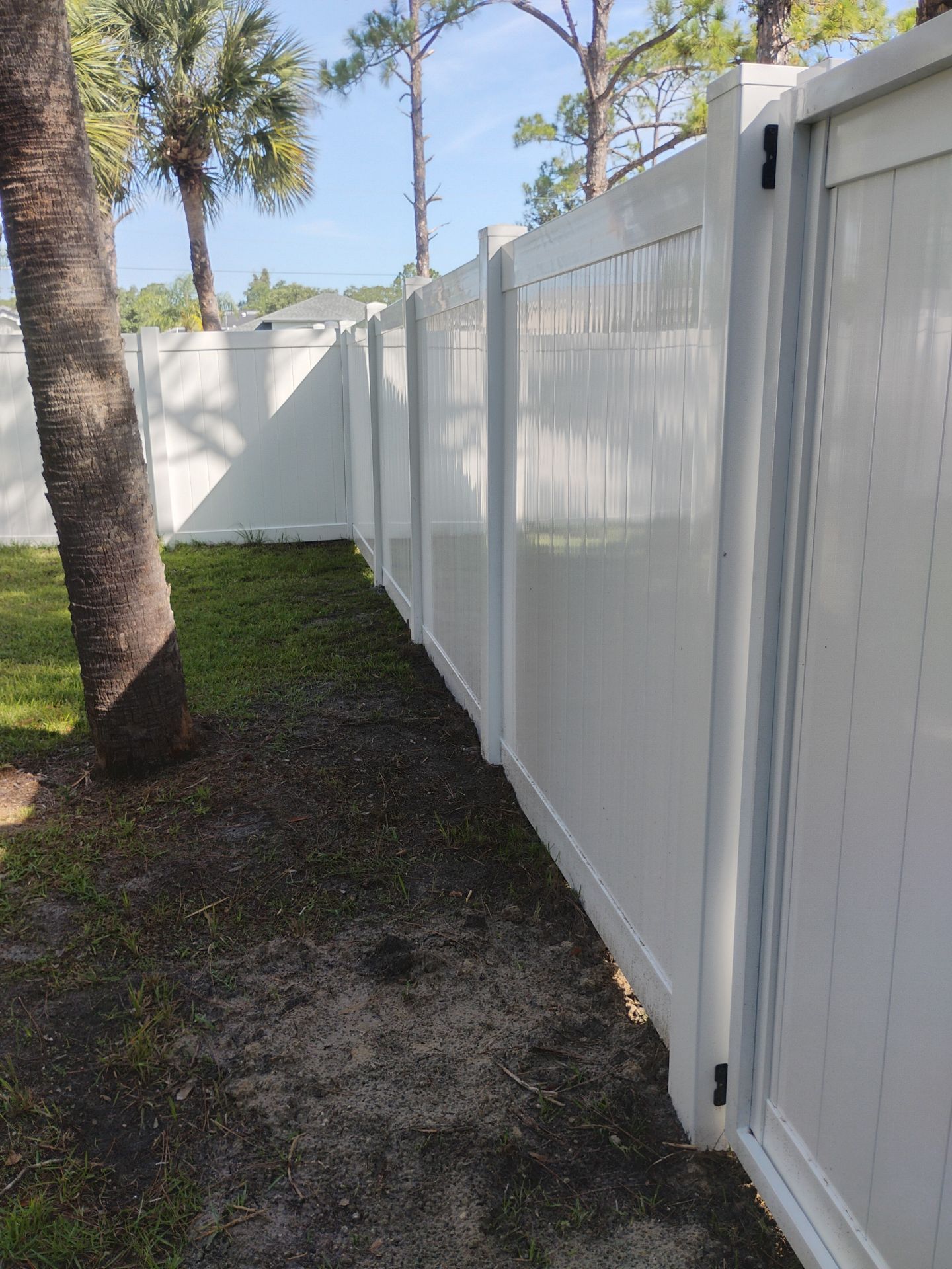 Vinyl Privacy Fence and Double Gate Installation in North Port by True Fence LLC