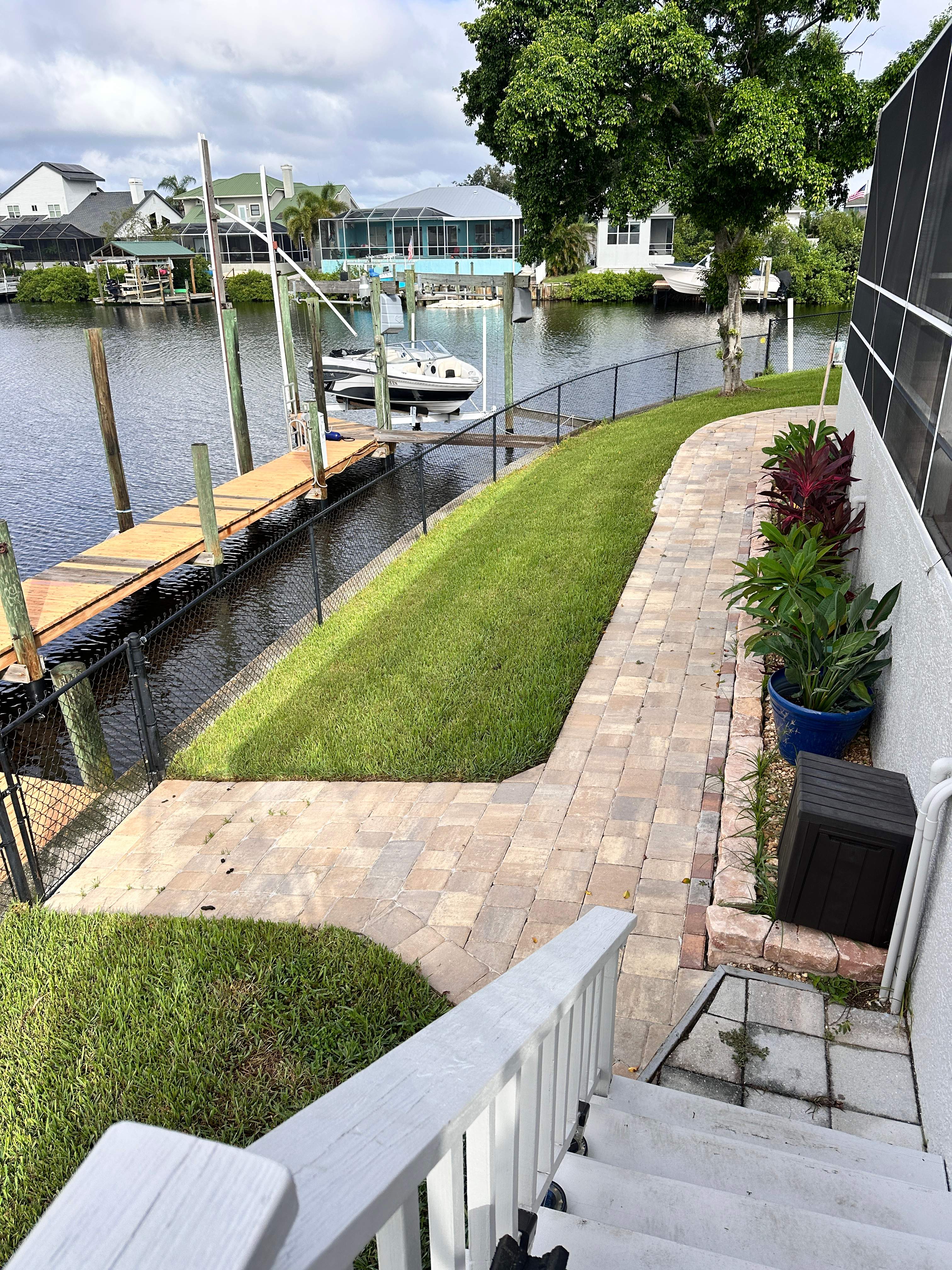 Travertine Sealing and Stripping for a Waterfront Pool Deck in Apollo Beach by Supreme Paver Experts