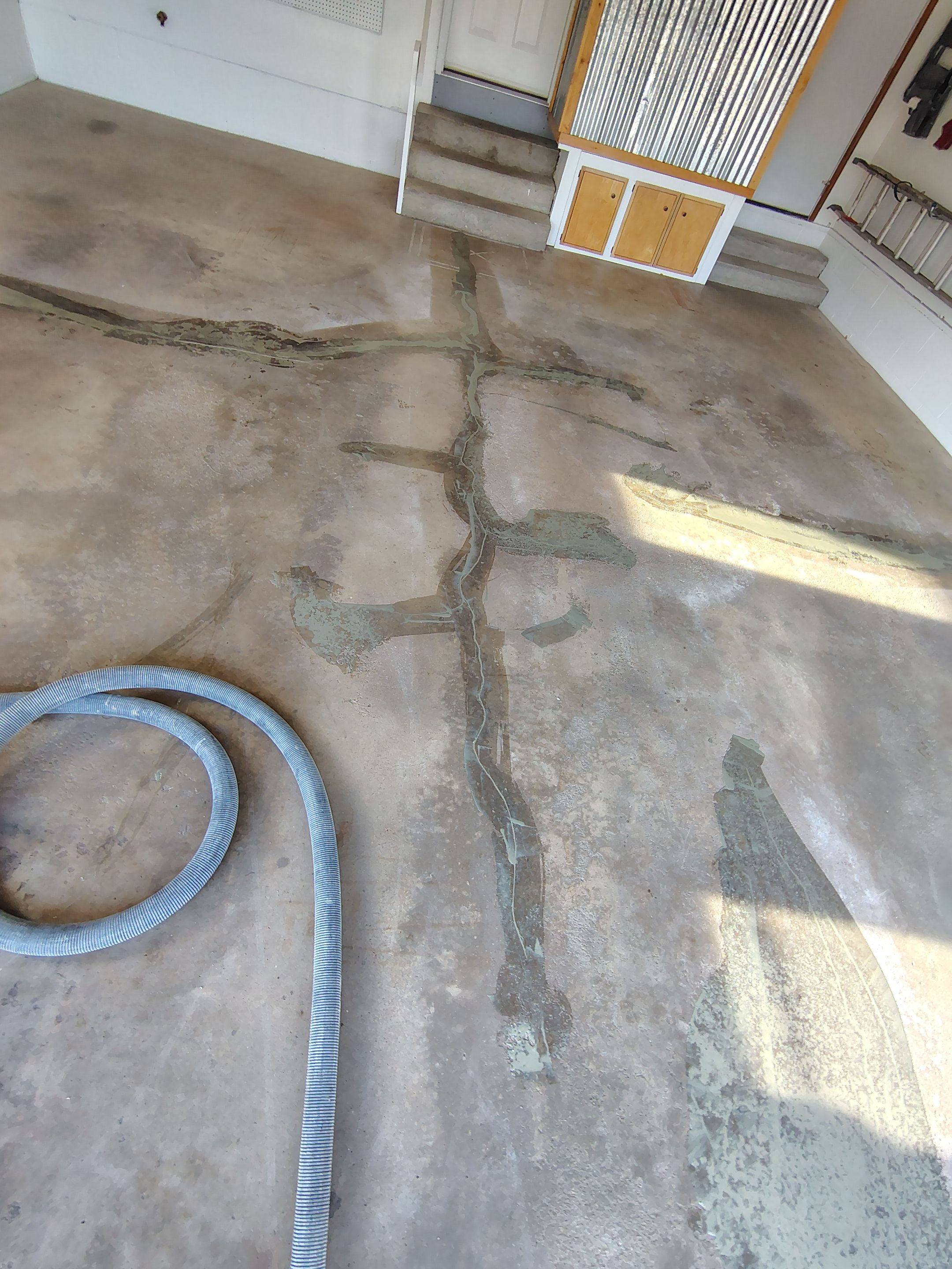 Multi-Colored Flake Epoxy Garage Floor Coating and Crack Repair by Select Painting, Coatings & Garage Cabinets