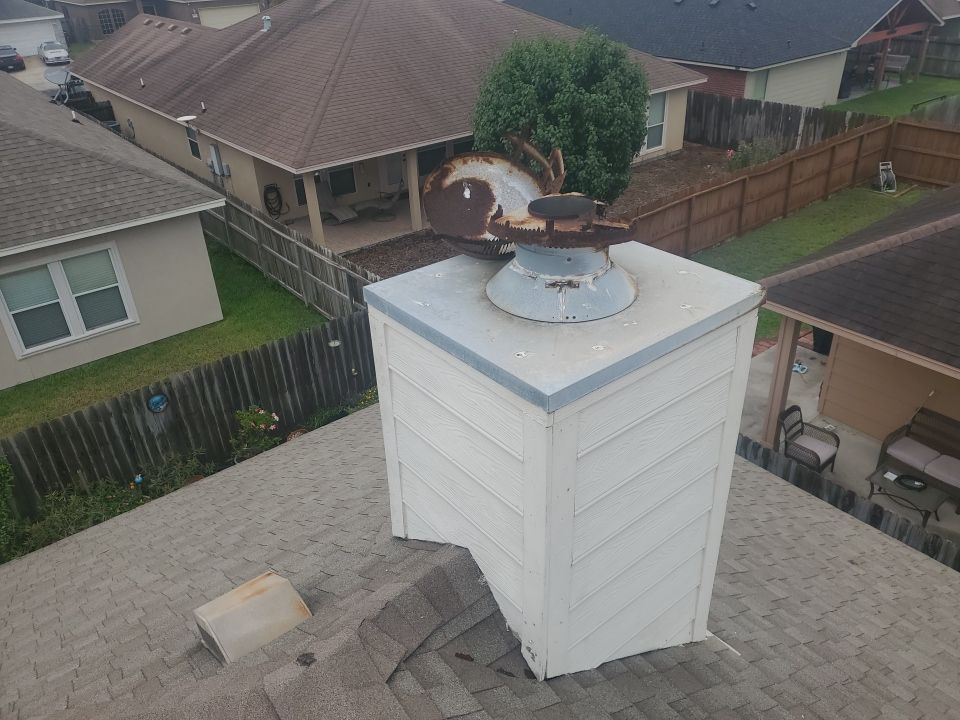 Chimney Cap Replacement using Custom Fabricated Stainless Steel by Lighthouse Roofing