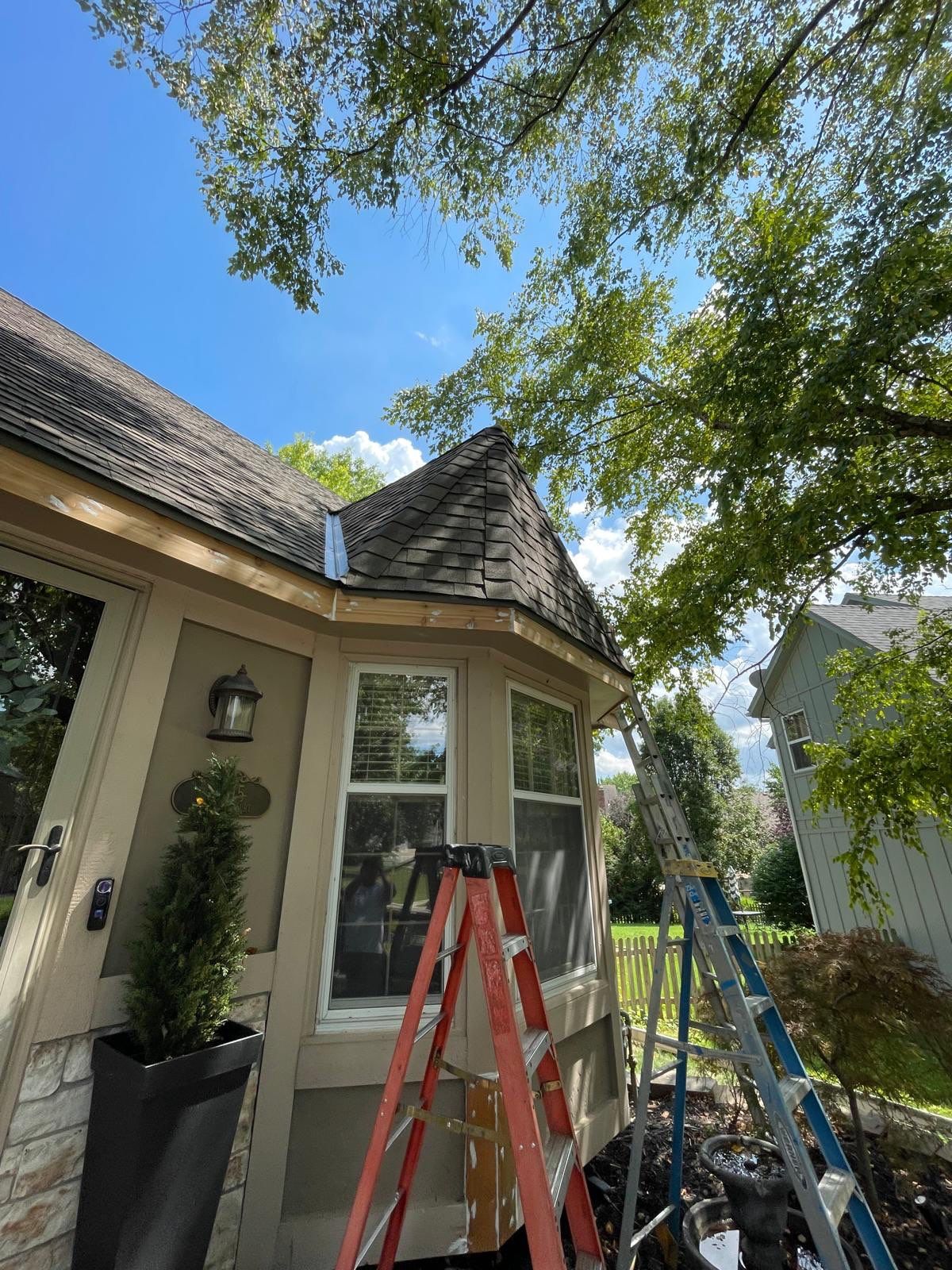 Shoji White Exterior Painting and Comprehensive Wood Rot Repair in Overland Park by Cougar Painting