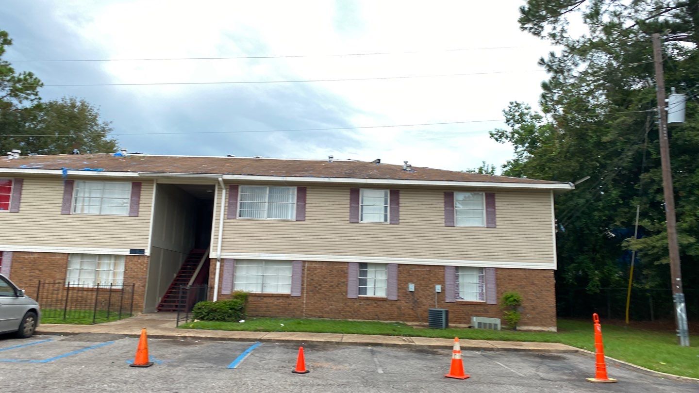Commercial Roofing Installation using Roof Replacement by American Roofing & Construction LLC