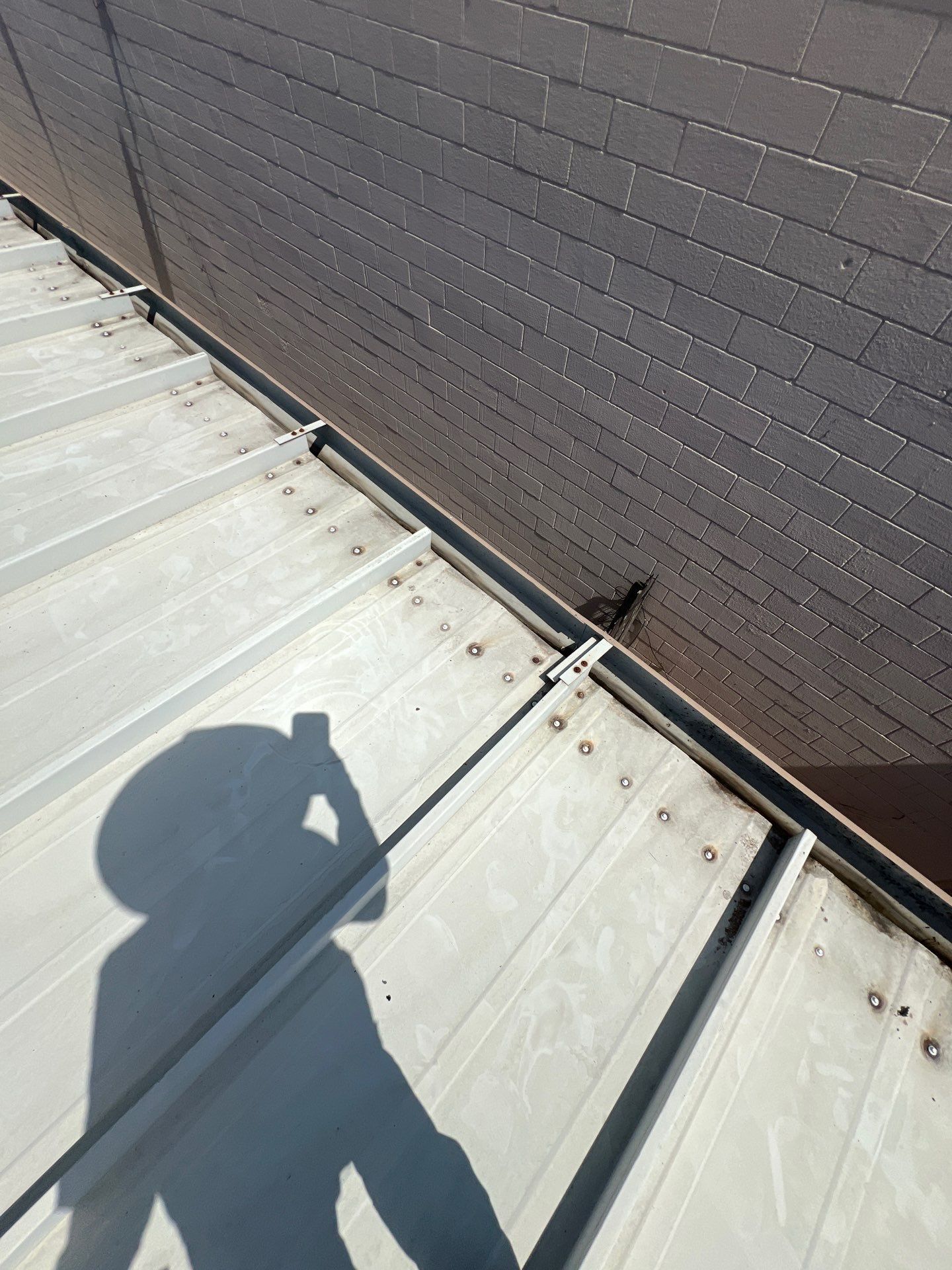 Commercial Roofing Repair using Metal by Roof Repair Company