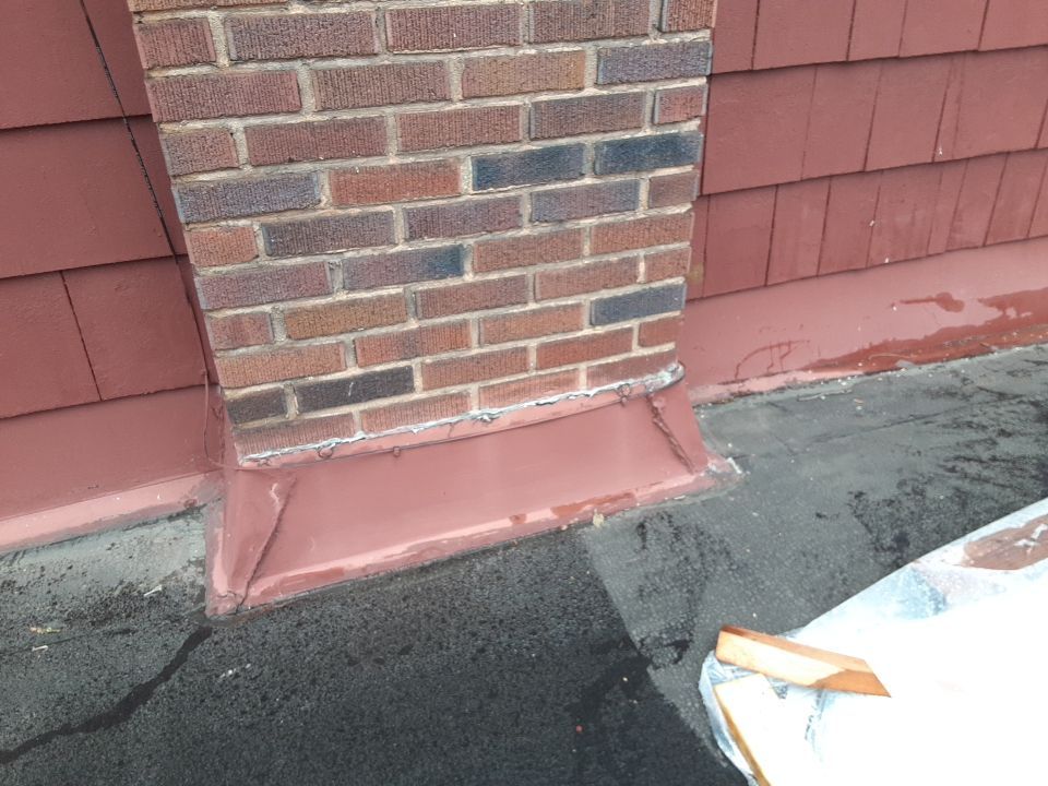 Residential Roof Replacement using Patio Roof by Absolute Roofing and Construction