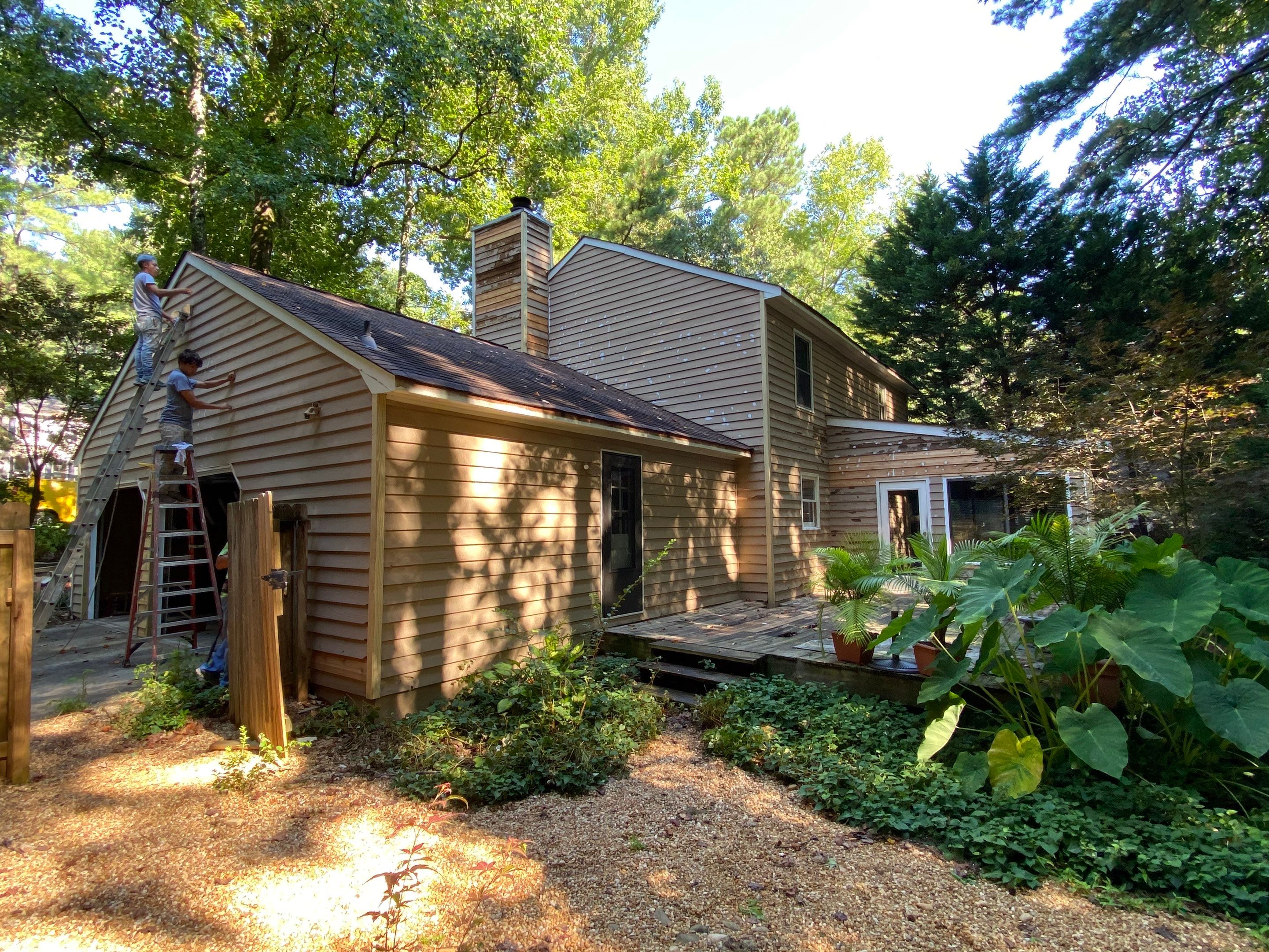 Mableton Exterior Painting and Pressure Treated Wood Deck Installation by Swift Home Renovations