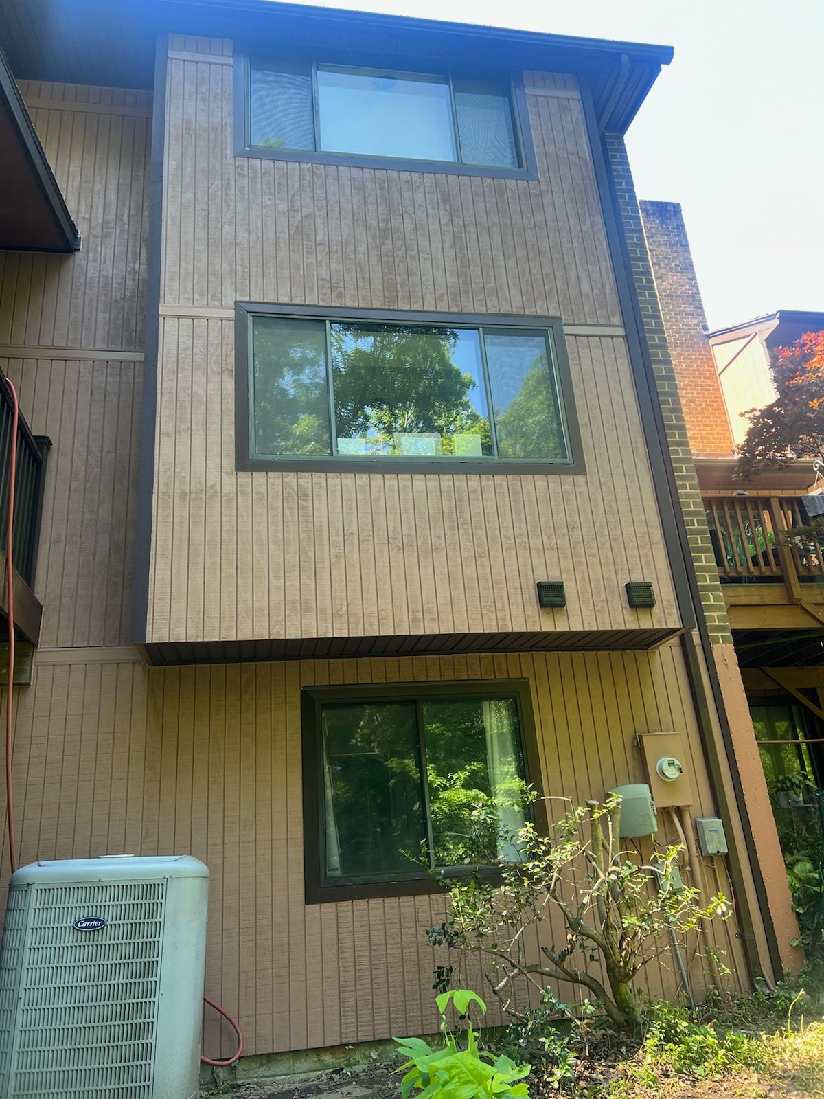 Woodbridge: T1-11 Pywood Panel Siding Installation by RM Banning, Inc.
