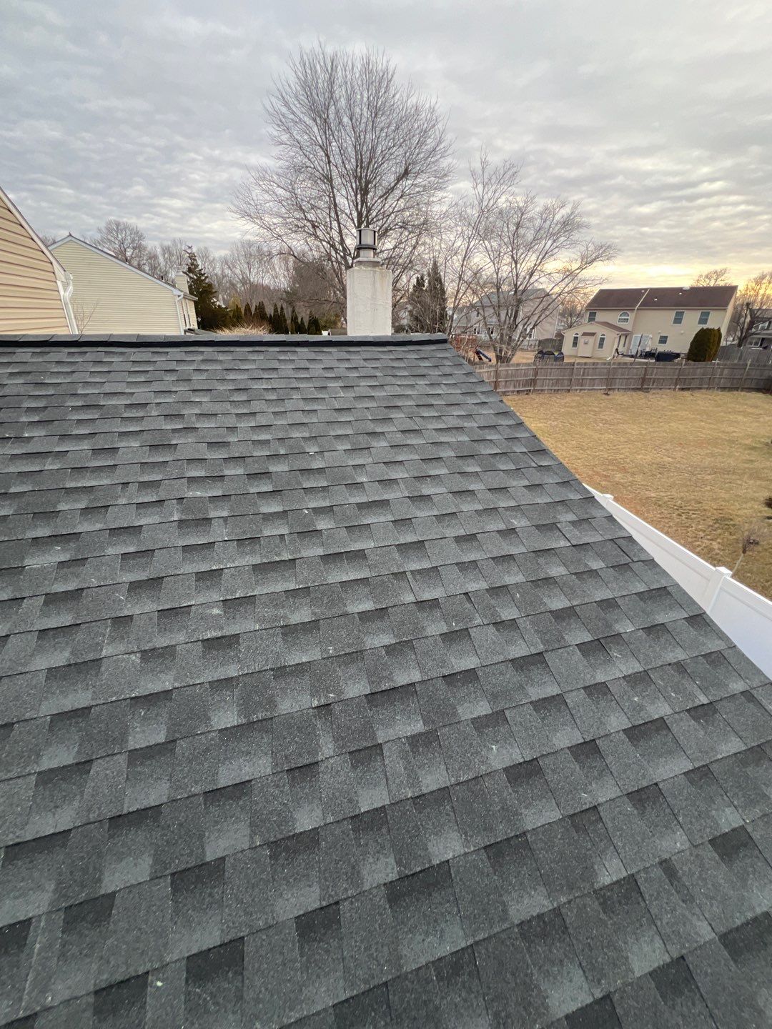 Estate Gray Shingles by Reimagine Roofing