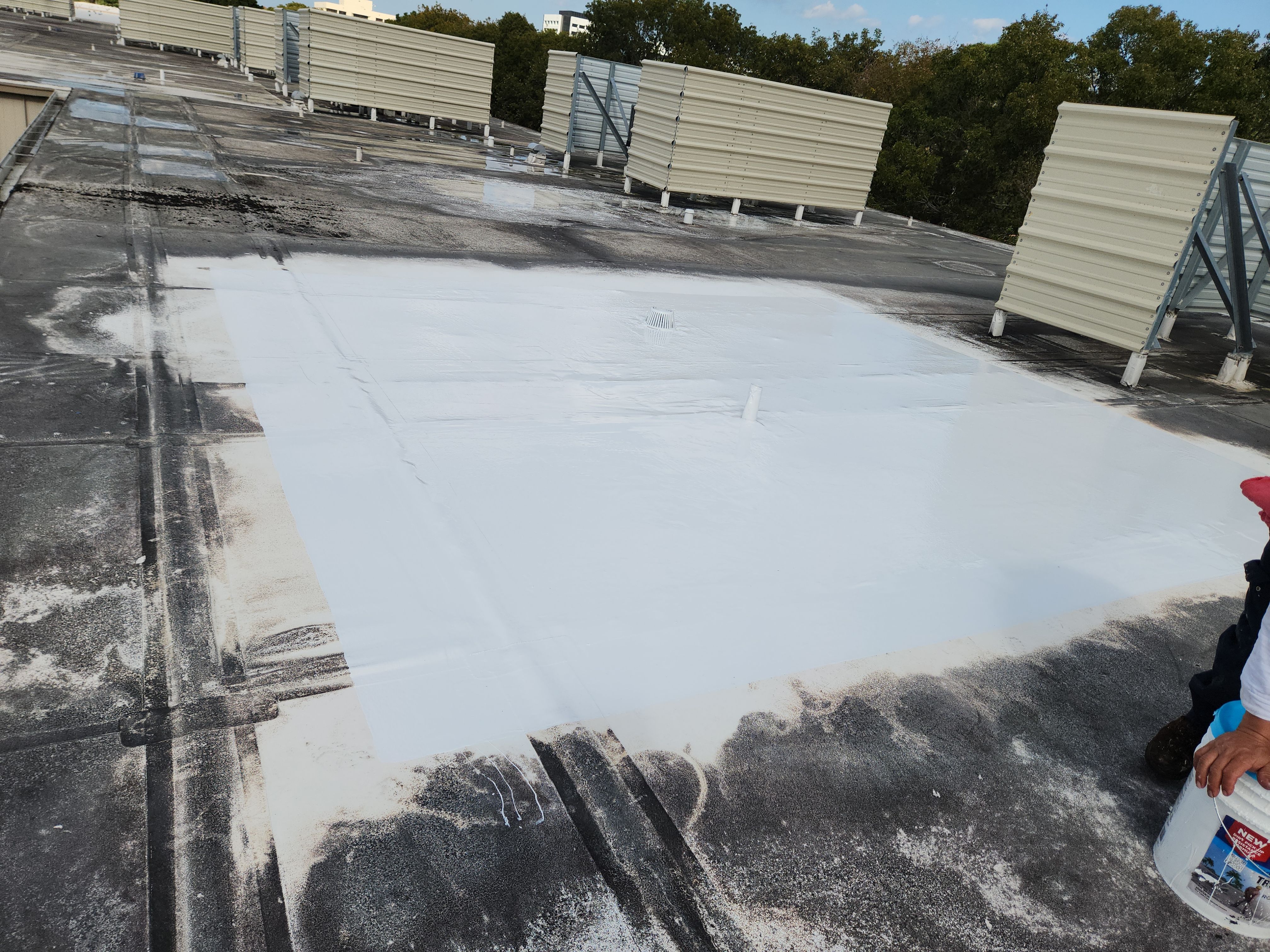 Reflective Silicone Roof Coating and Maintenance in Palm Beach Gardens by Aastro Roofing