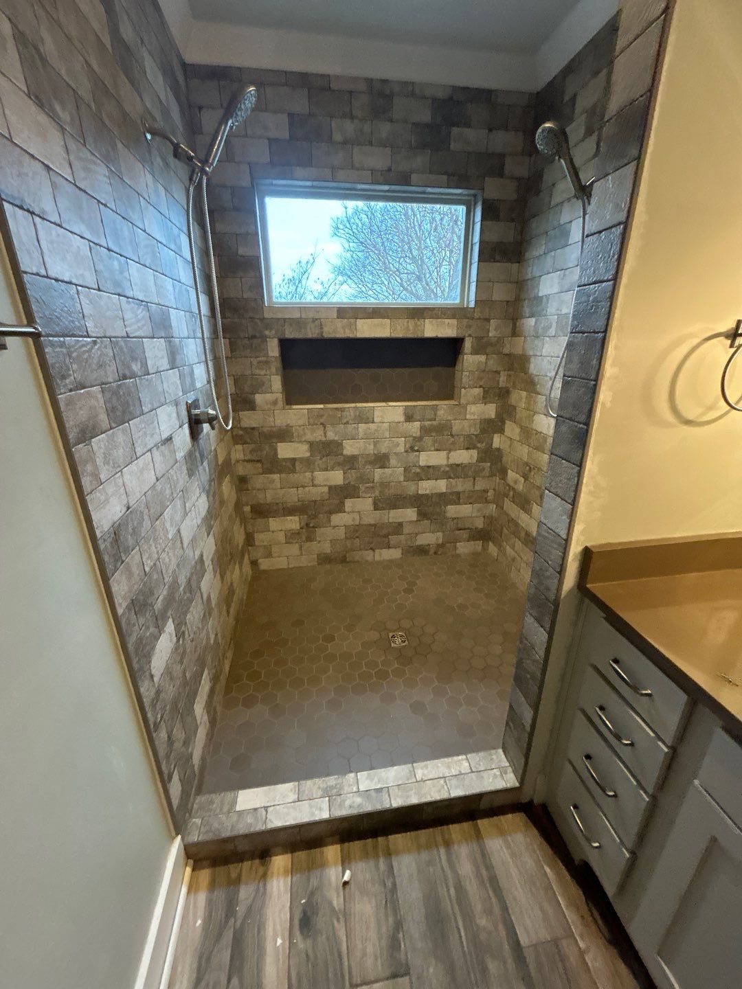 Shower upgrade by Footprints Floors of Nashville