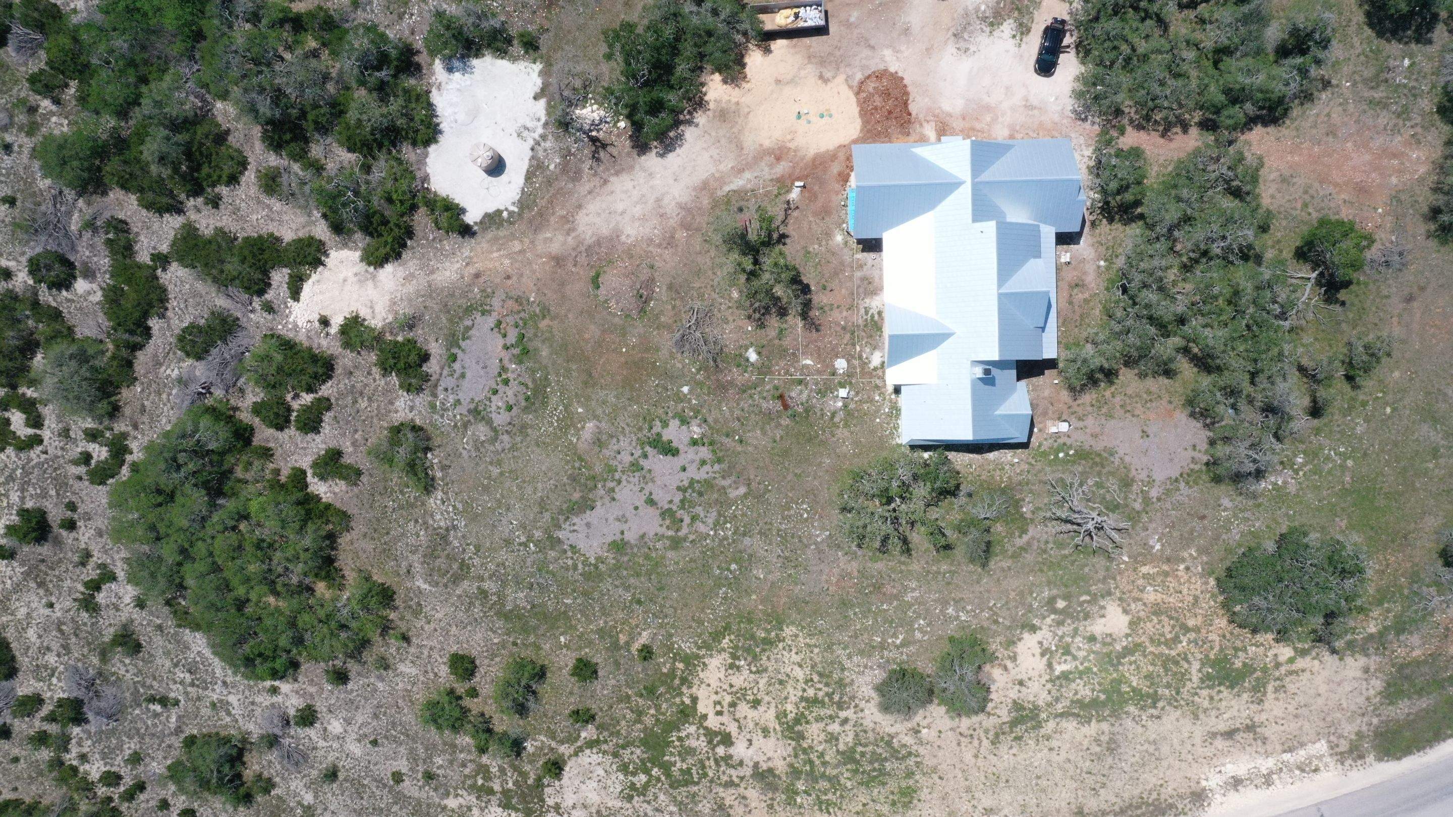 Residential Rainwater Collection System - Pioneer 40K gallon water tank in Mangrove Green by Hill Country Rain Water