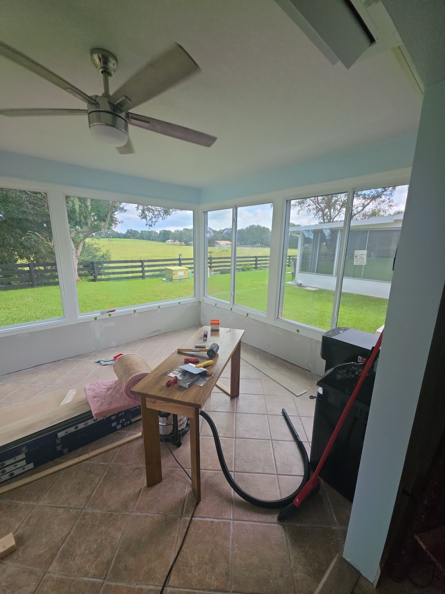 Sunroom Conversion with Alside Windows and Provia Door in The Villages by Windows & Doors Store