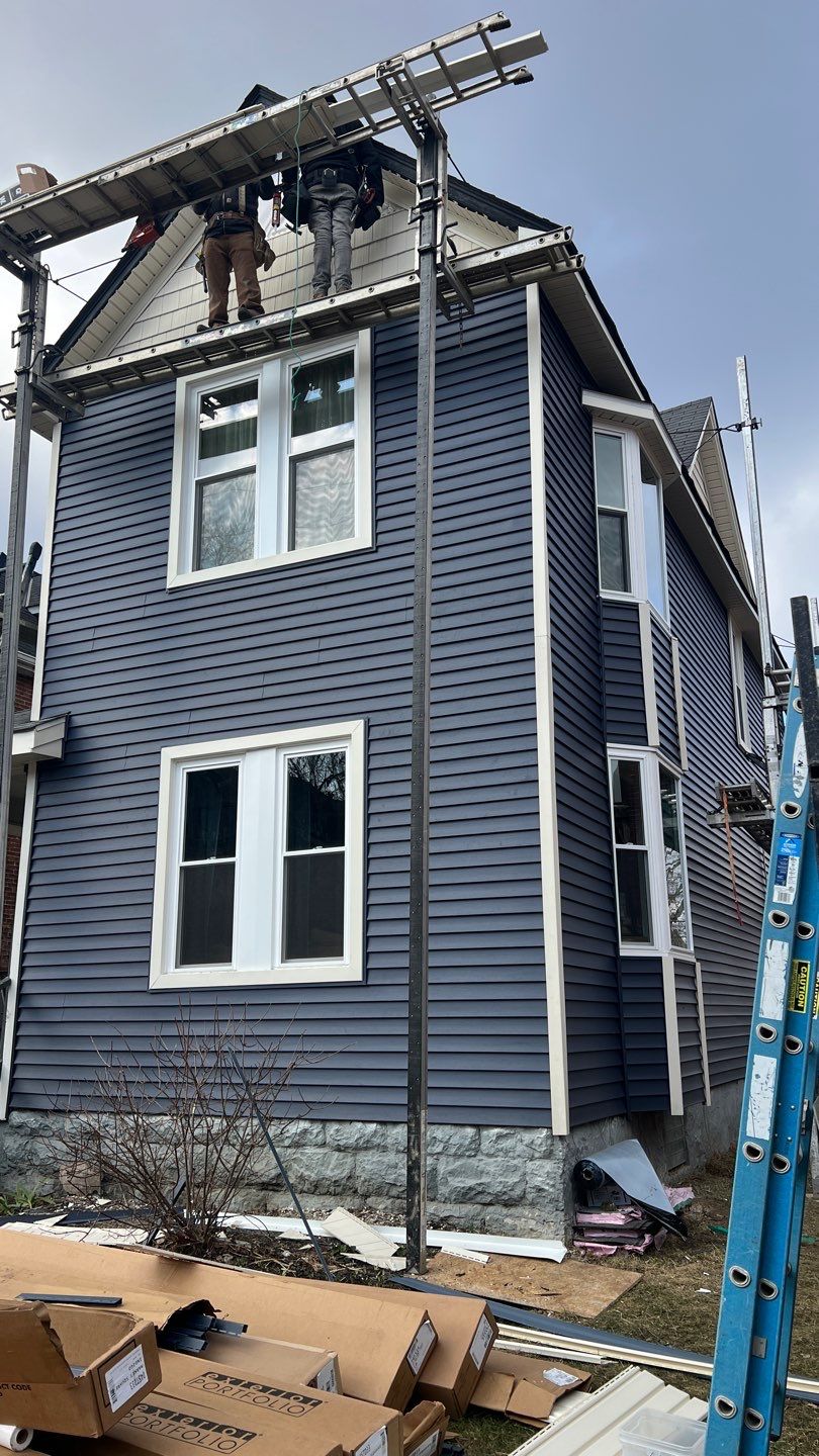 Adding Windows and installing Siding by Know-A-Guy Roofing & Exteriors