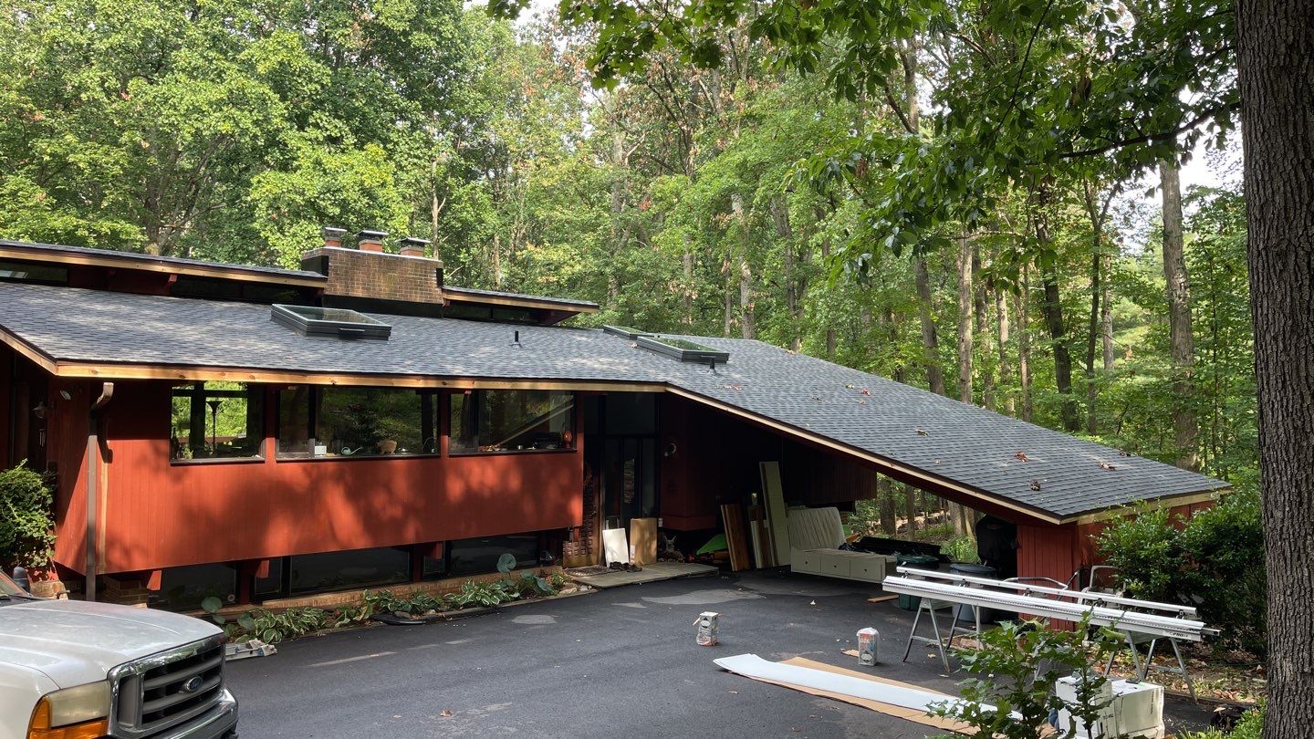 Deckhouse Roof Replacement by American Home Contractors