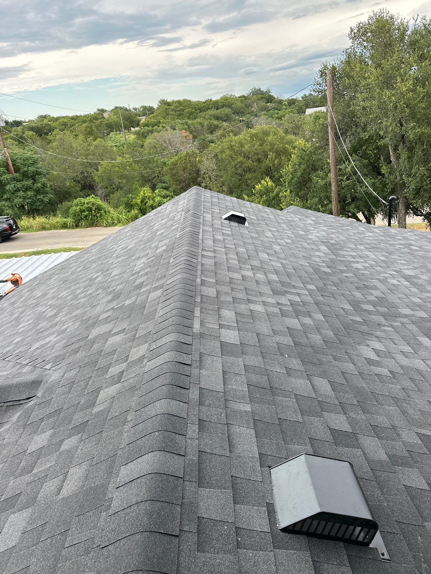 Residential Roofing Installation using Owens Corning Oakridge Onyx Black by DeZign Roofing & Exteriors