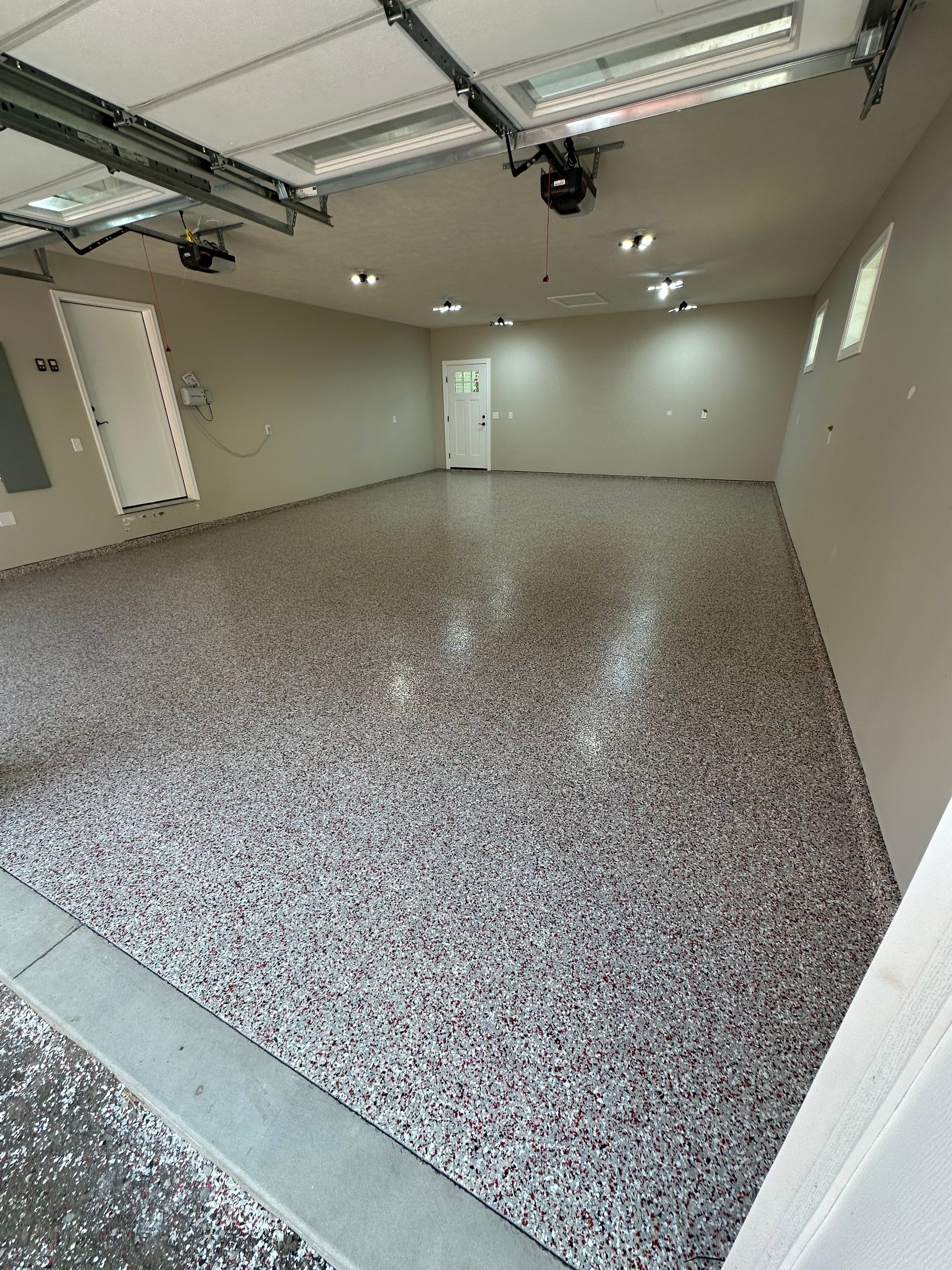 GO BIG RED: Custom Flake Epoxy Garage Floor in Lincoln by Goat Coatings