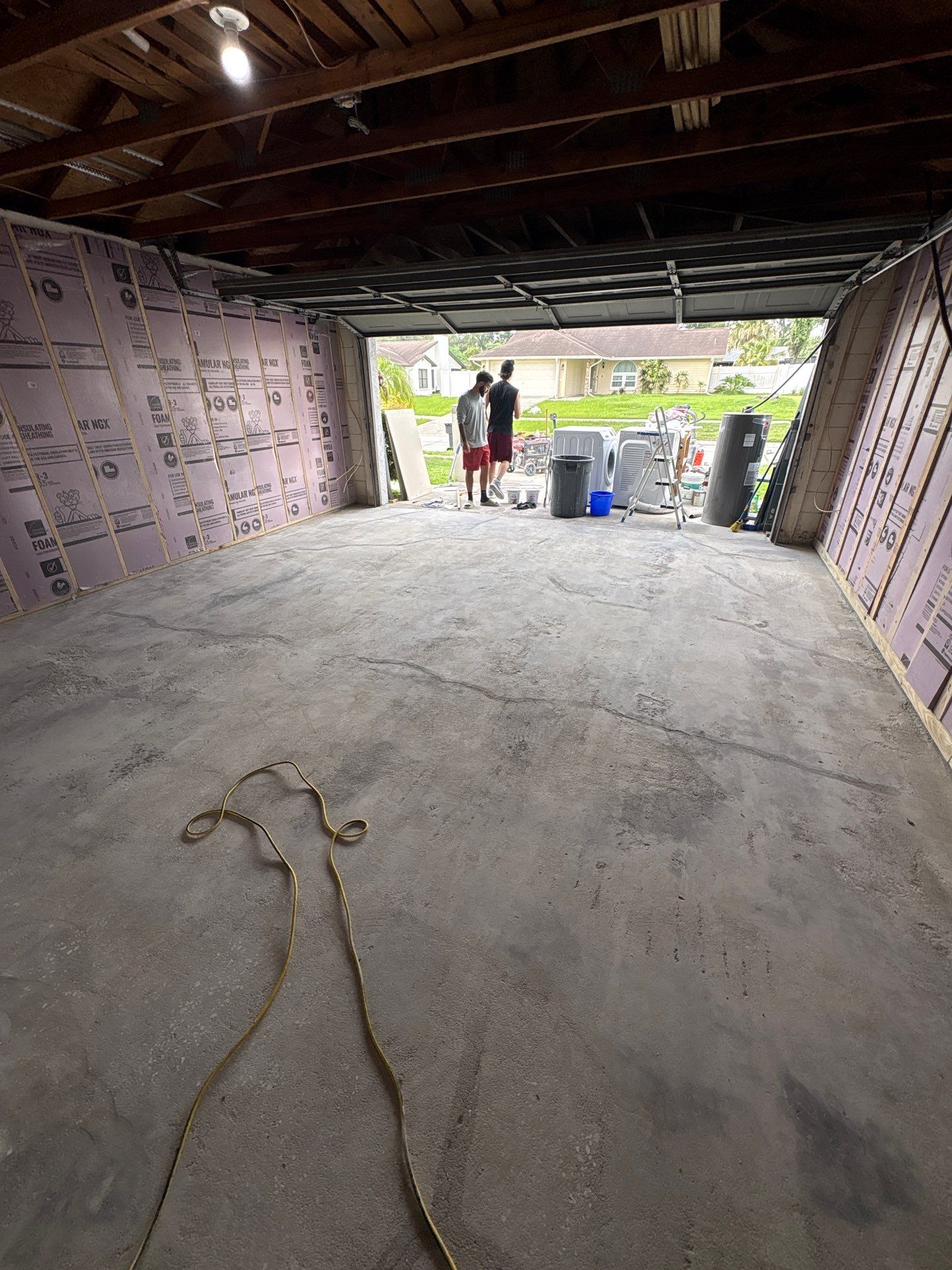 Gravel Flake Epoxy Garage Floor Installation in Brandon, Florida by Performance Floors & Coating