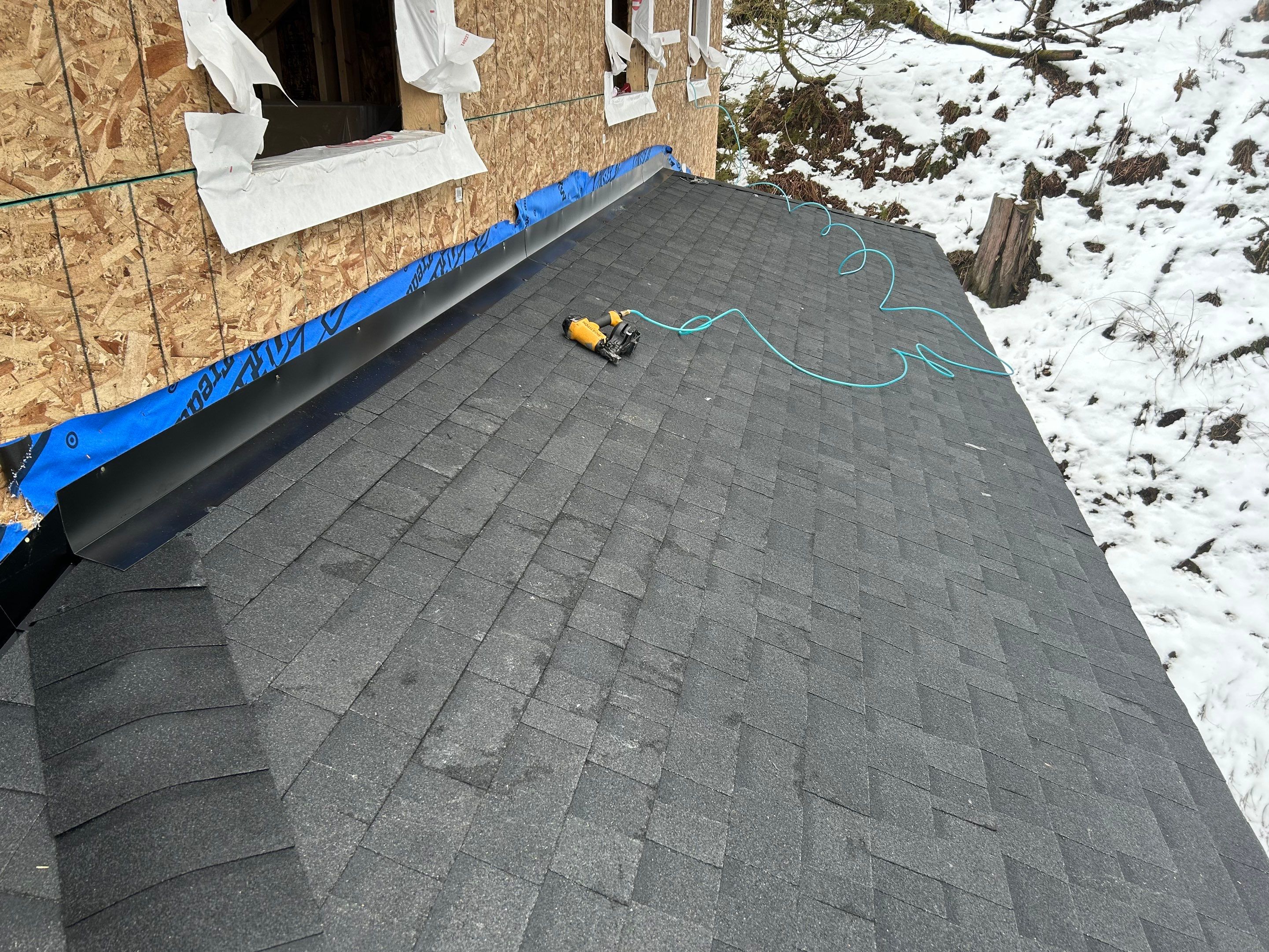 Residential Roofing Installation using OC Oakridge shingles by Top Notch Roofing Inc