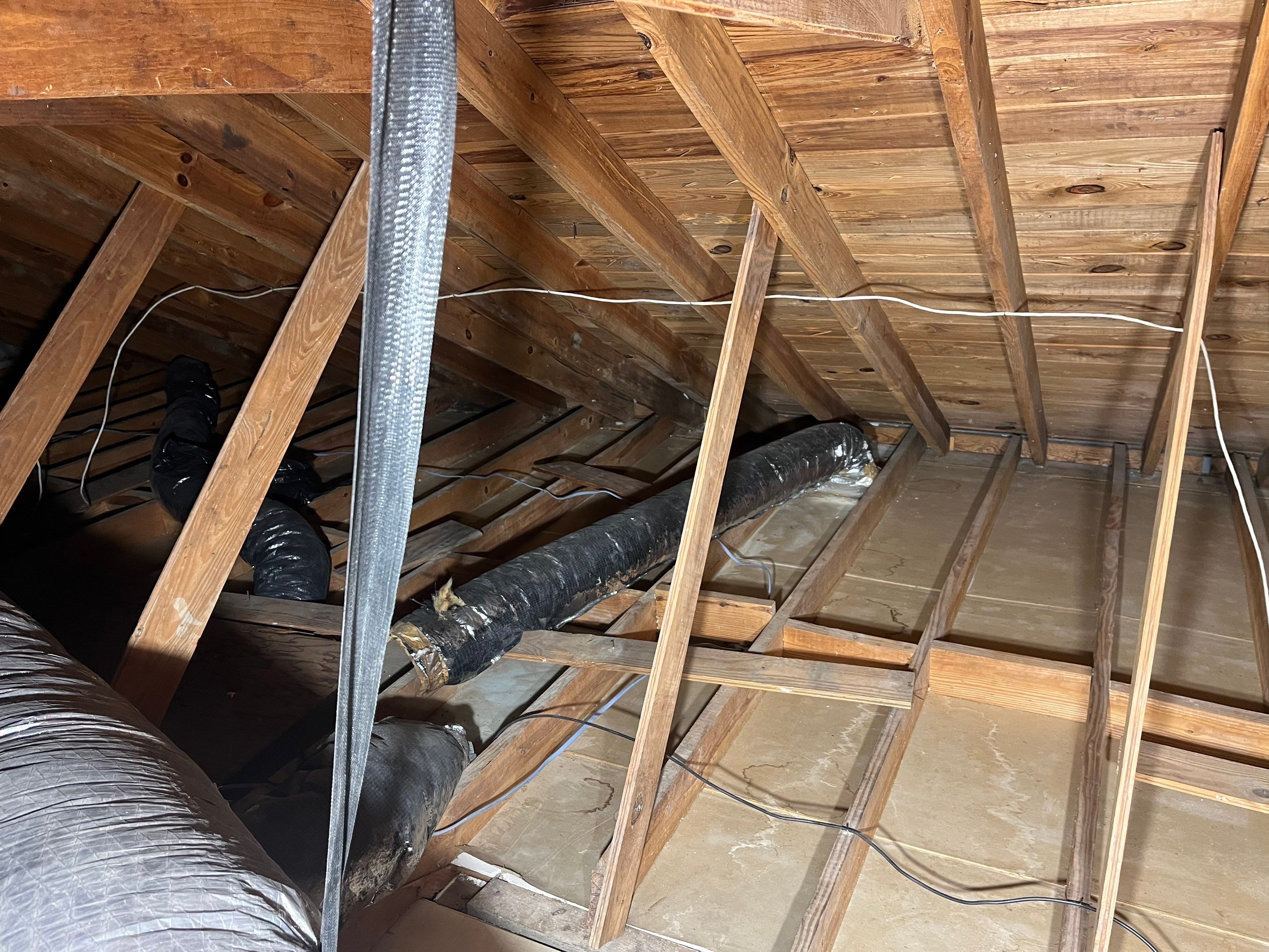 Abatement level clean of non-ACM vermiculite insulation by EAS Environmental, LLC.