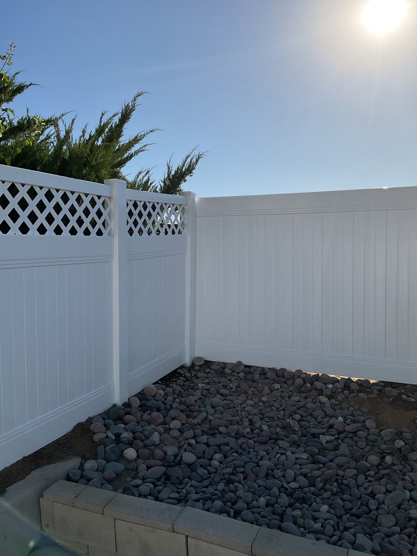 Lattice Vinyl with Privacy Vinyl Fence by Fence Guys Inc.