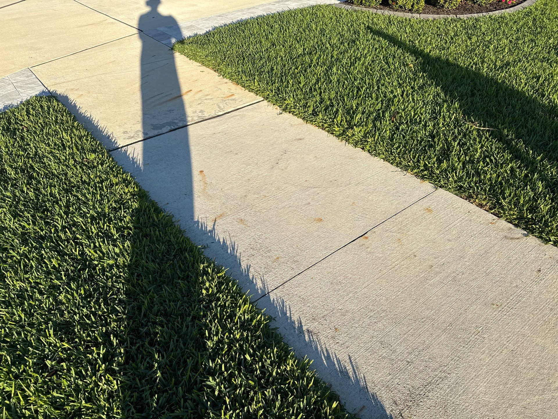 Rust Stain Removal from Concrete Driveway and Pavers in Park East at Azario | Lakewood Ranch, FL by Sunshine AquaWash