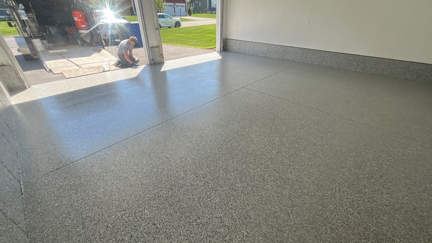 Garage in Londonderry, NH 03053 by Symphony Concrete Coatings