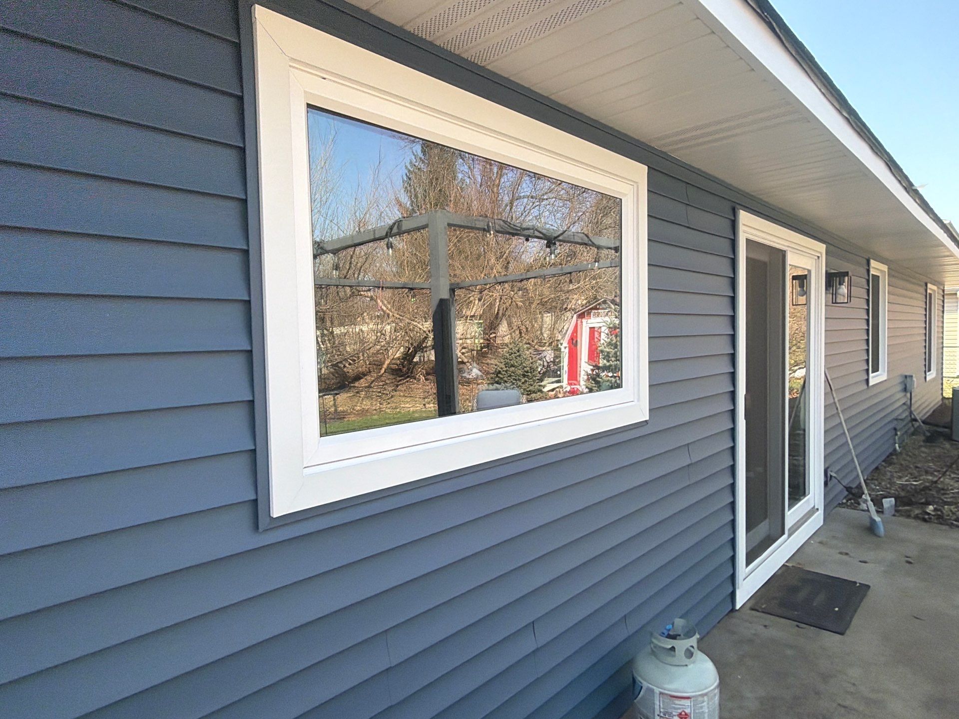 Siding and gutters replacement by Optimal Home Improvement 