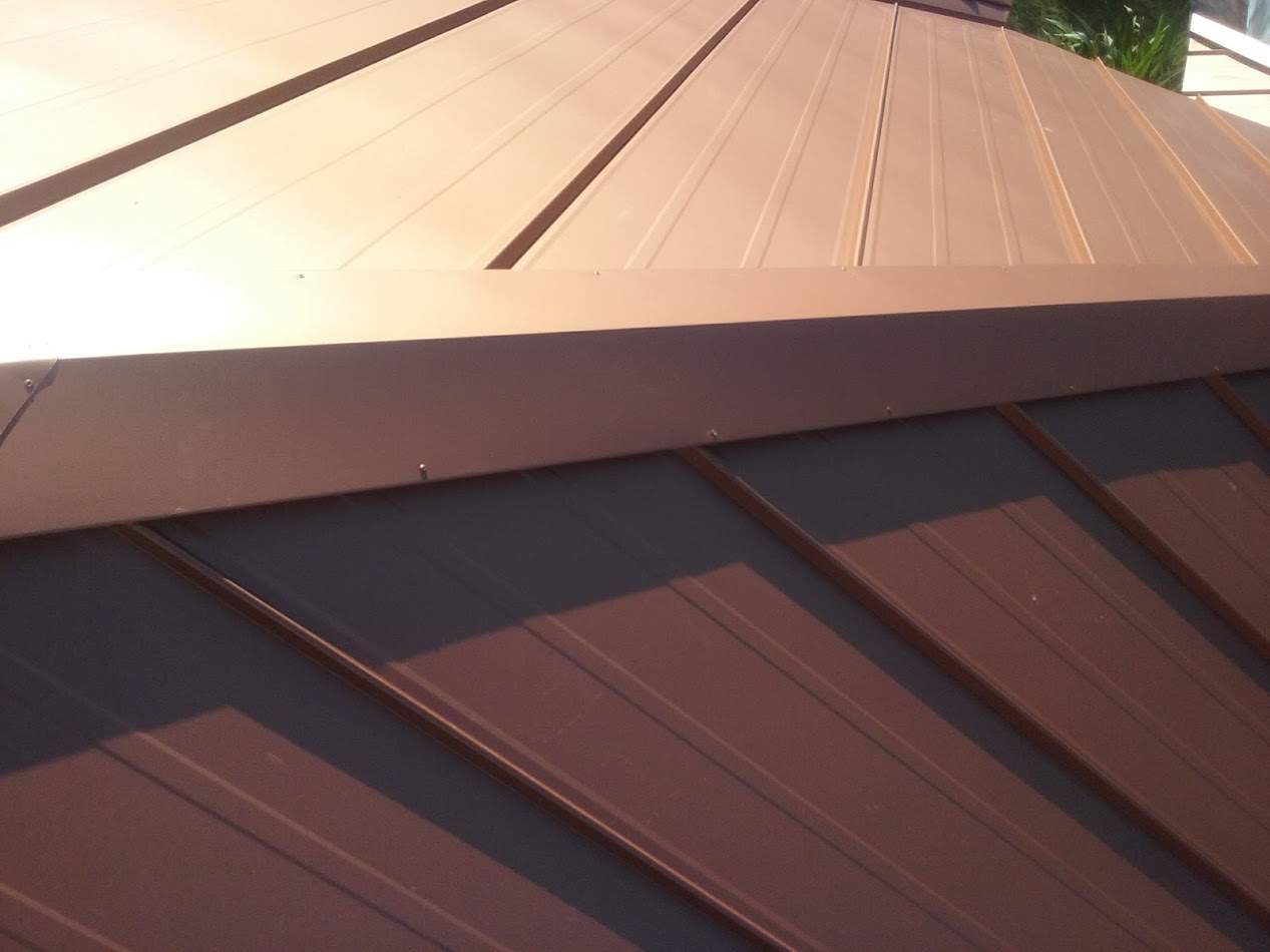 Residential Roofing Installation using 1" Nail strip metal roof by BLUES BROTHERS CONSTRUCTION CORP