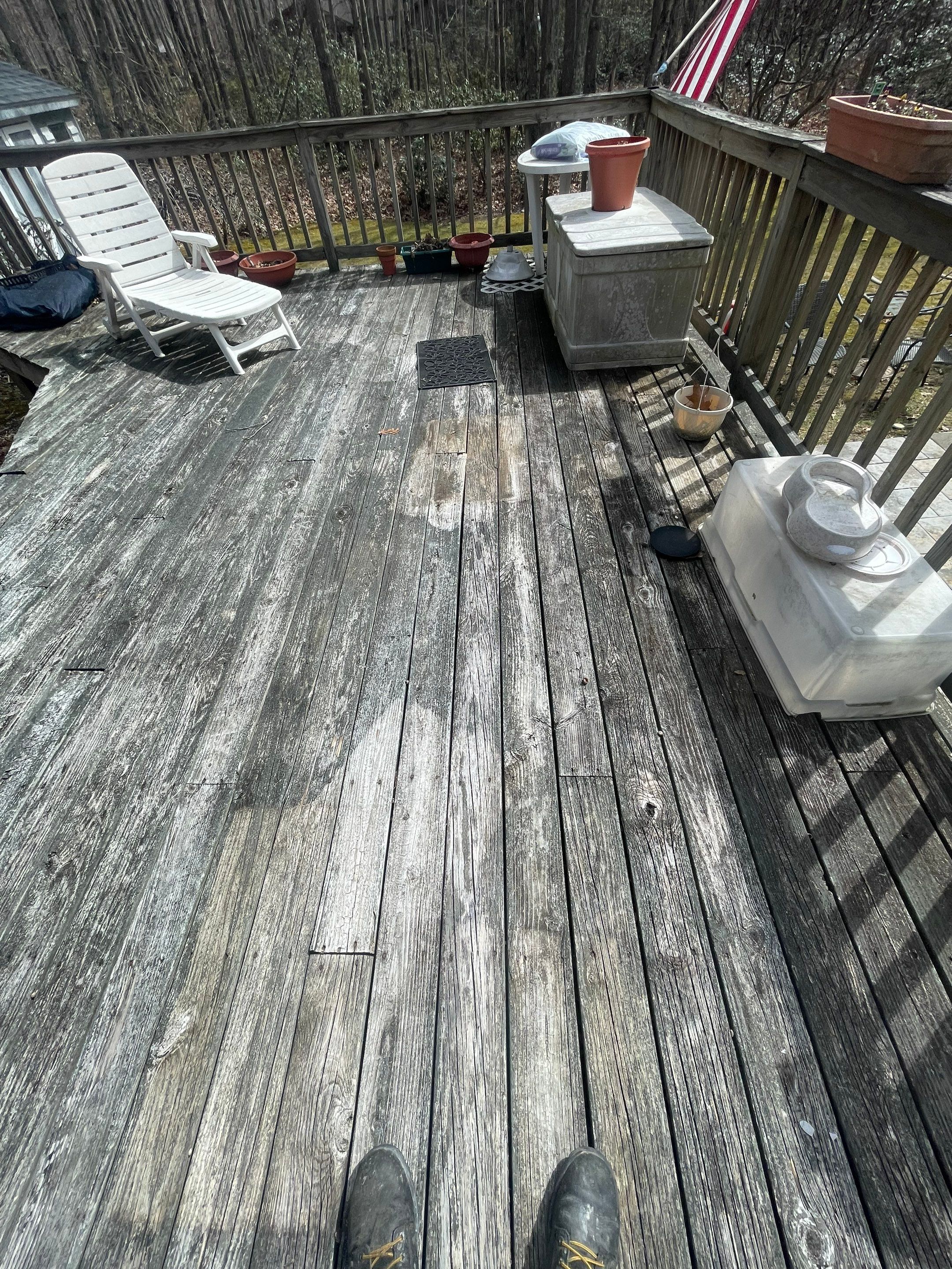 Pressure treated wood deck cleaned by SJ Exterior