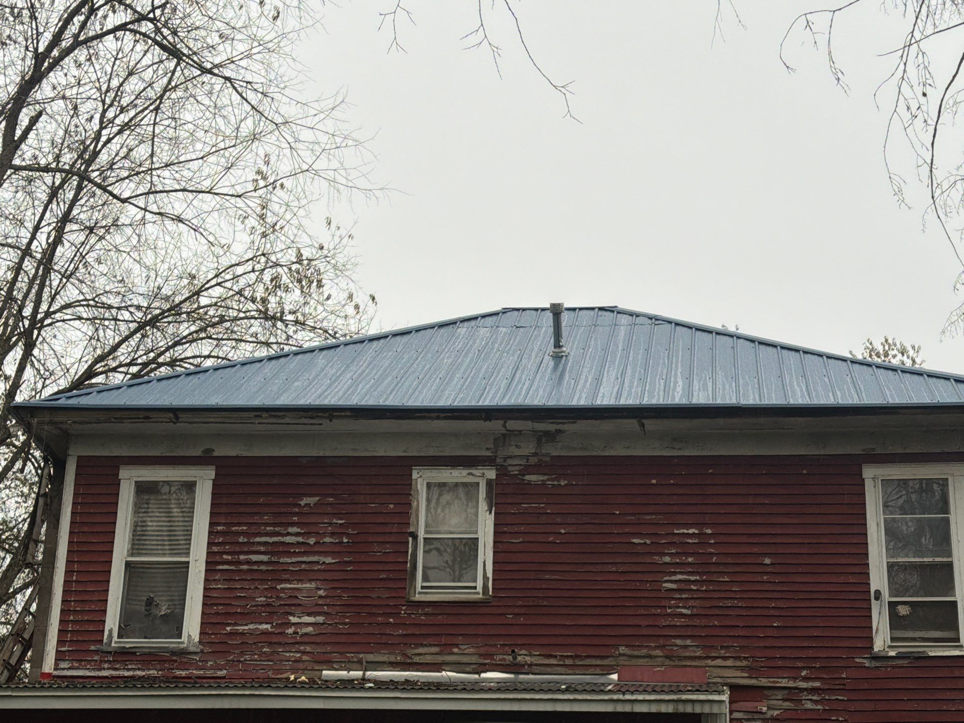 Residential Roofing Installation using Metal by Rainstoppers Roofing