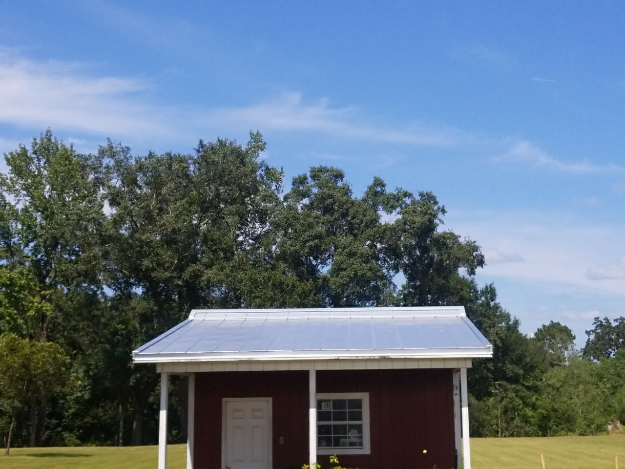 Residential Roofing Installation using Metal roofing by American Roofing & Construction LLC