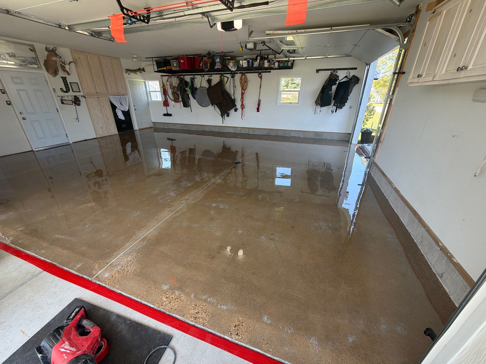 Custom Metallic Epoxy Floor and Polished Countertop Installation in Mears by Gordon Painting