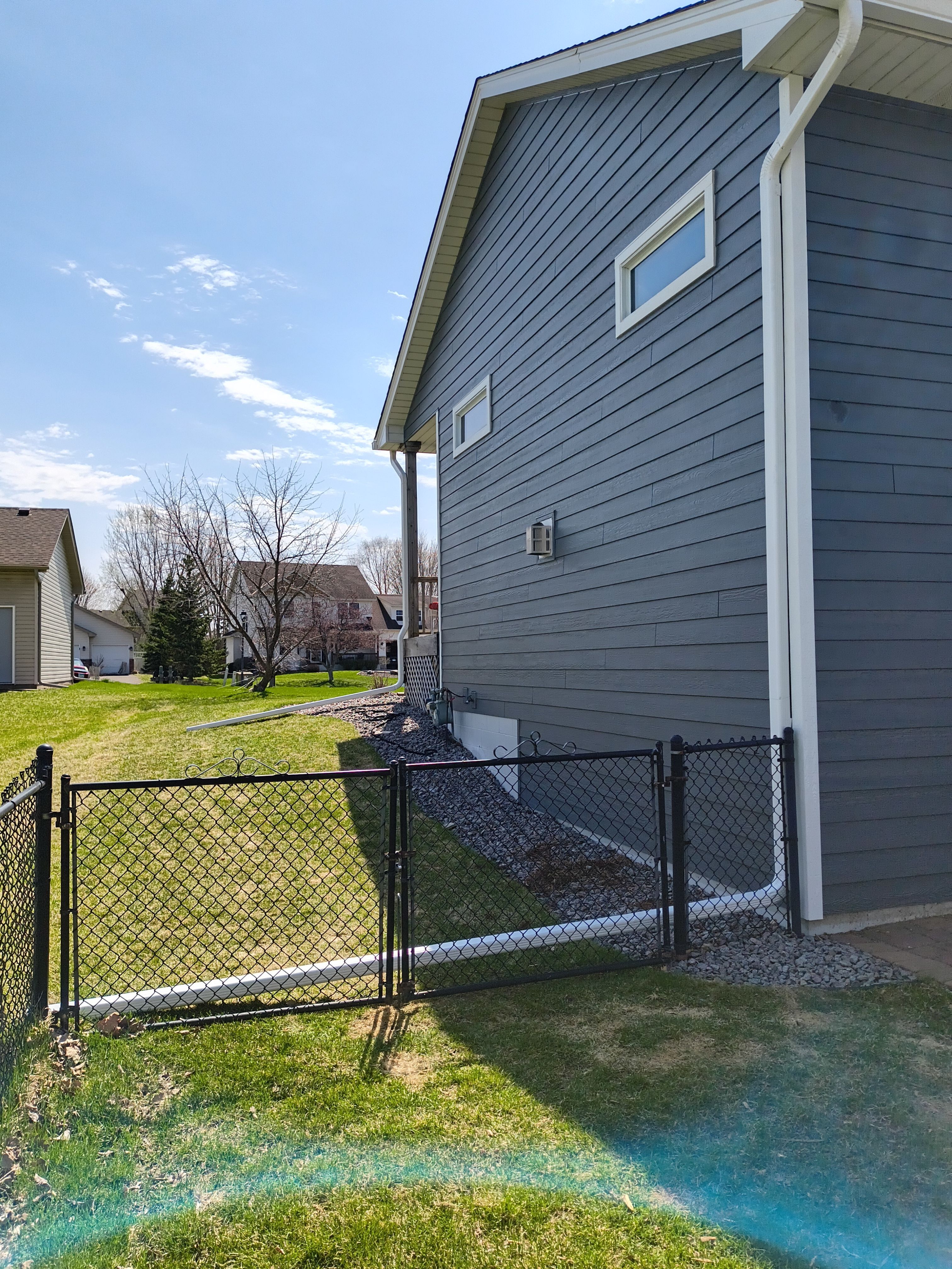 6” White Gutters & LeafBlaster Pro on 3-Story Home in St. Michael MN | by Next Level Seamless Gutters / Exteriors Inc.
