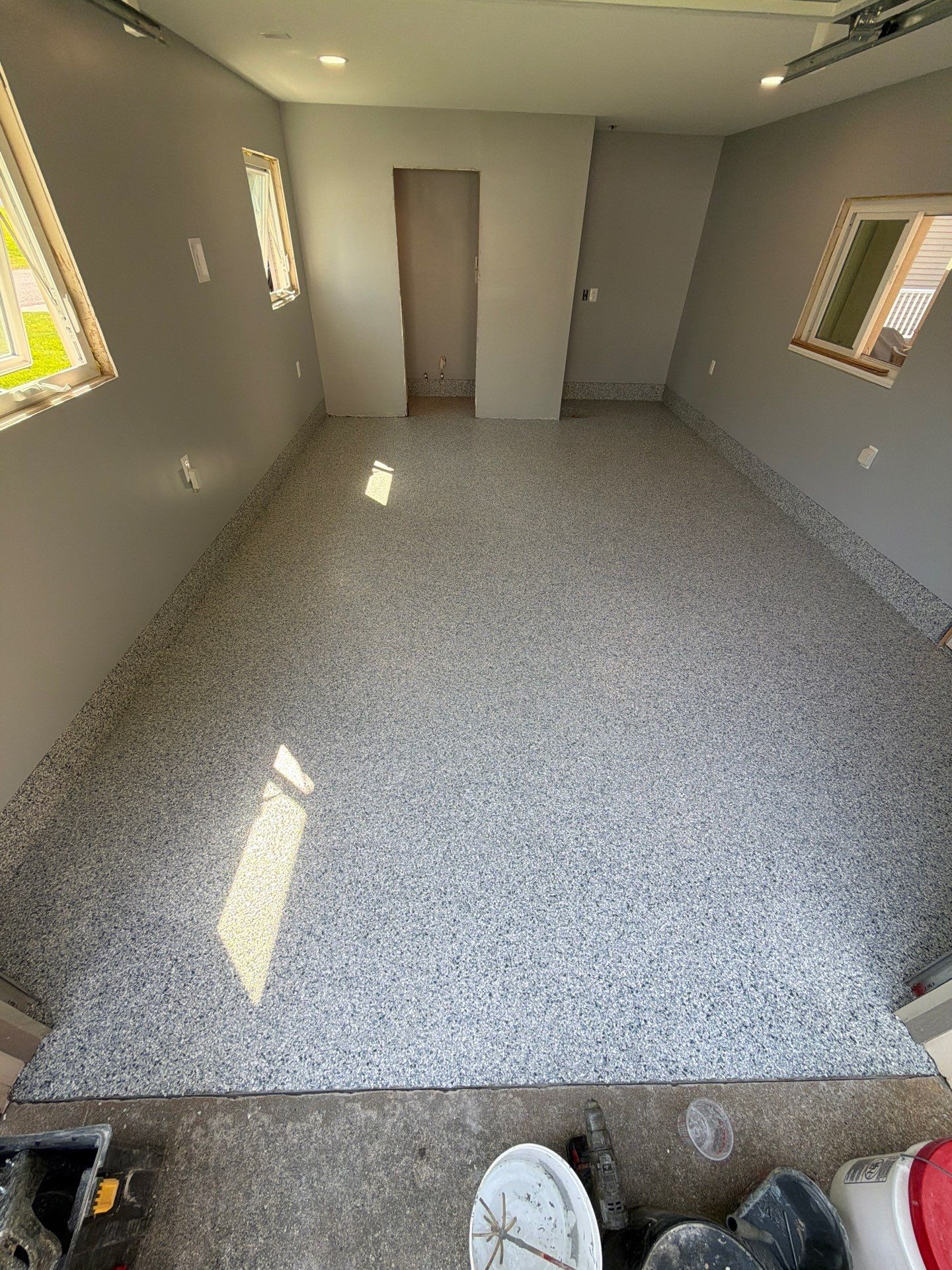 Custom Tidal Wave Epoxy Flake Floor Installation in Mears by Gordon Painting