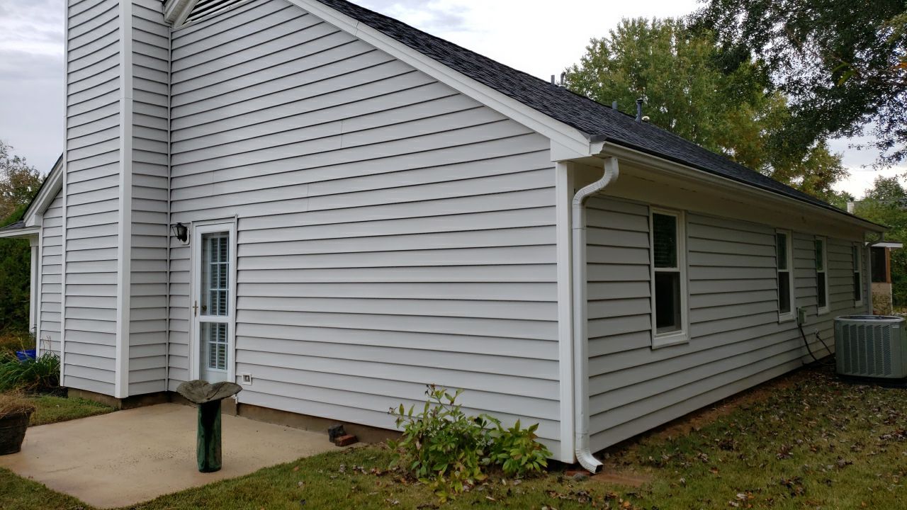 House Wash using cleaner  by Power Wash Masters LLC