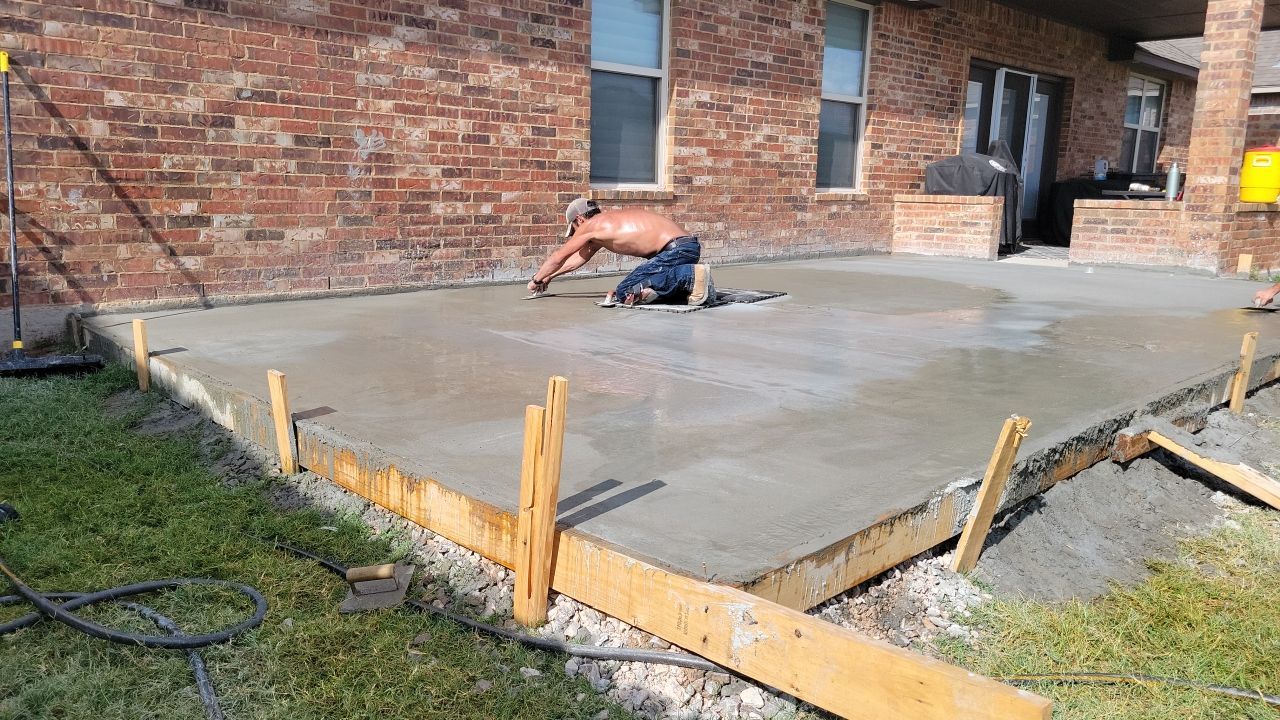 Concrete slab with Pergola by Clays Services Inc