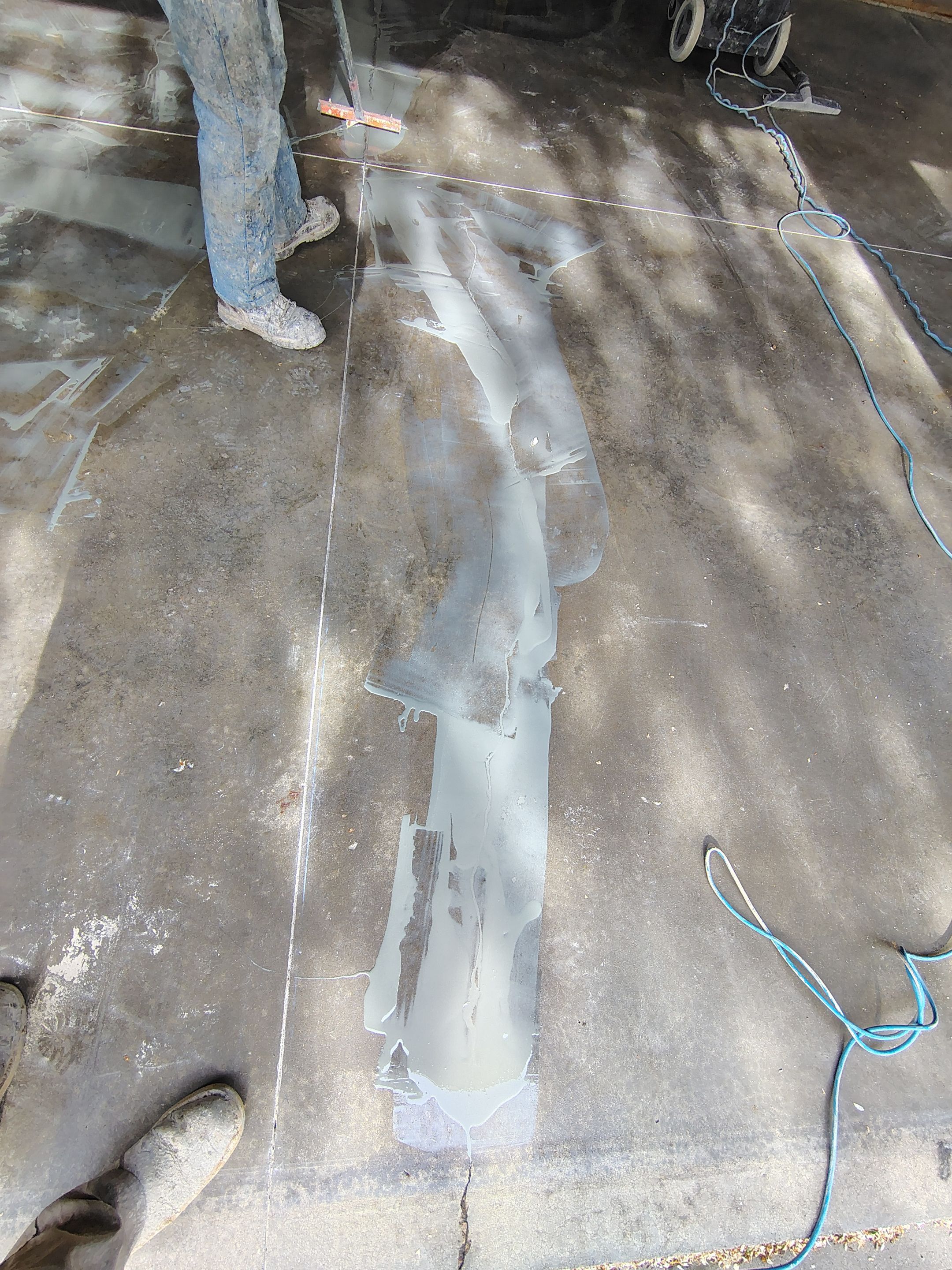 Garage Floor Concrete Coating and Crack Repair in Sioux Falls by Select Painting, Coatings & Garage Cabinets